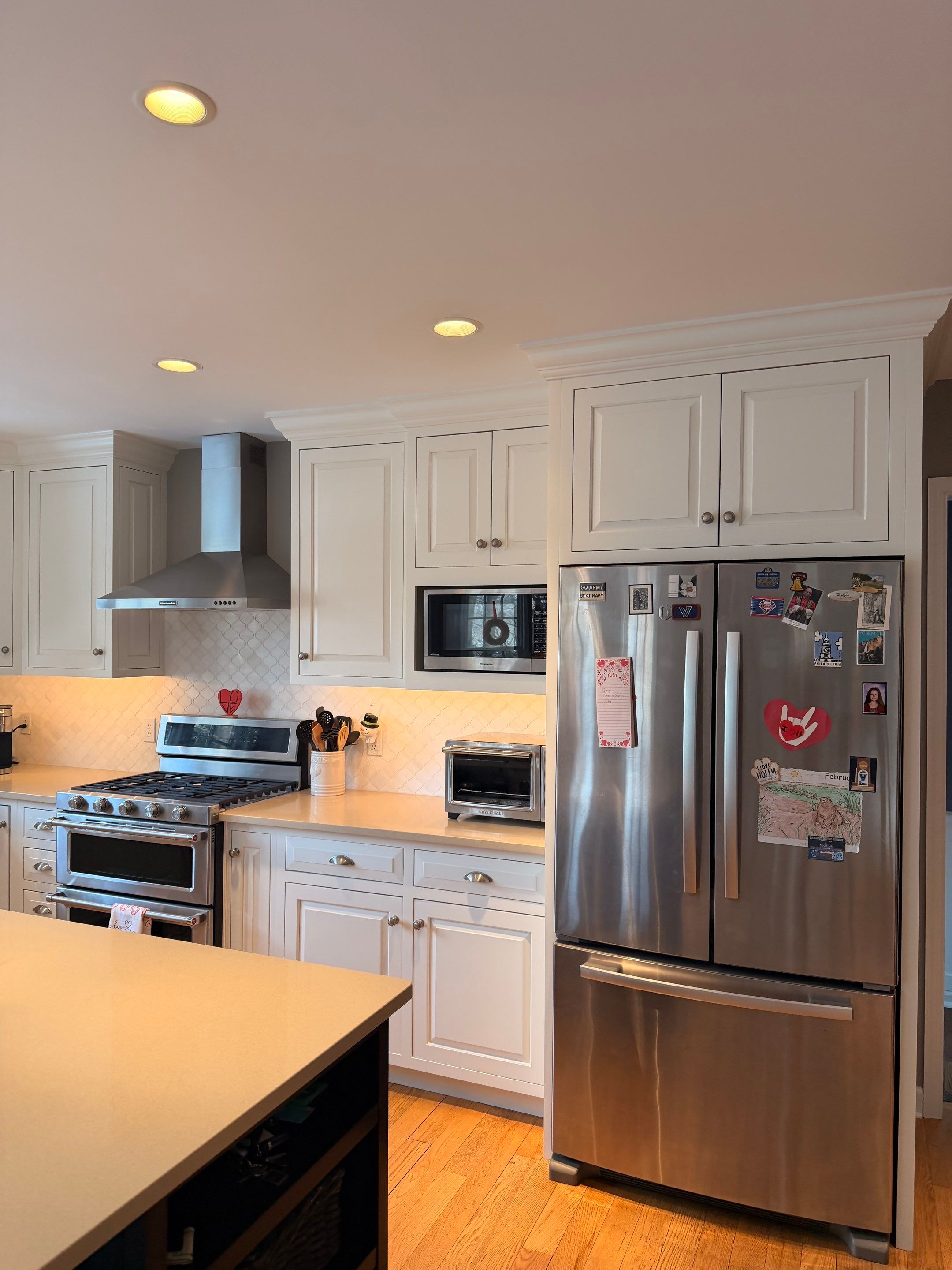 A Smooth, Factory Finish Kitchen Cabinet Transformation by Groovy Hues