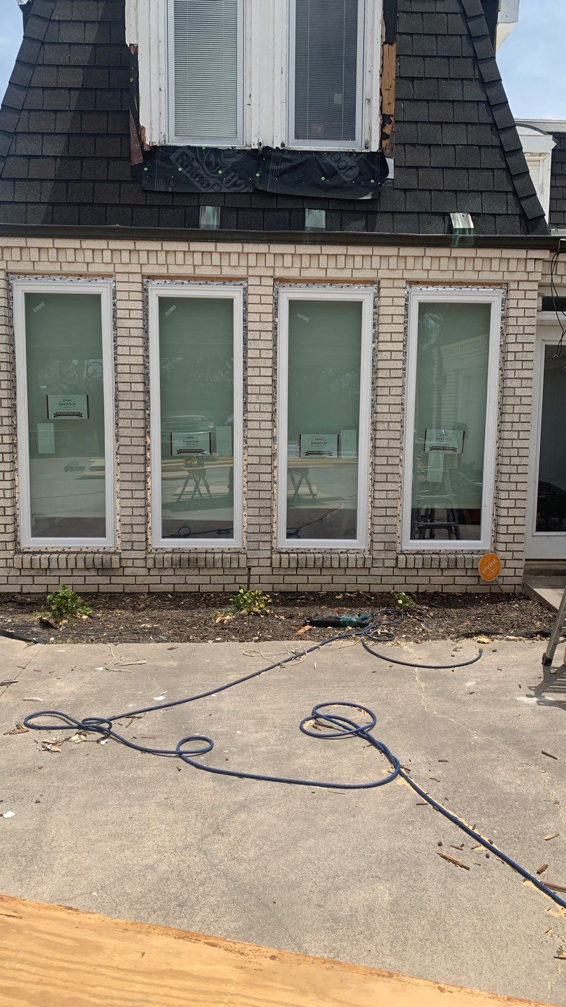 Mansard Charm by Bayfront Roofing and Construction