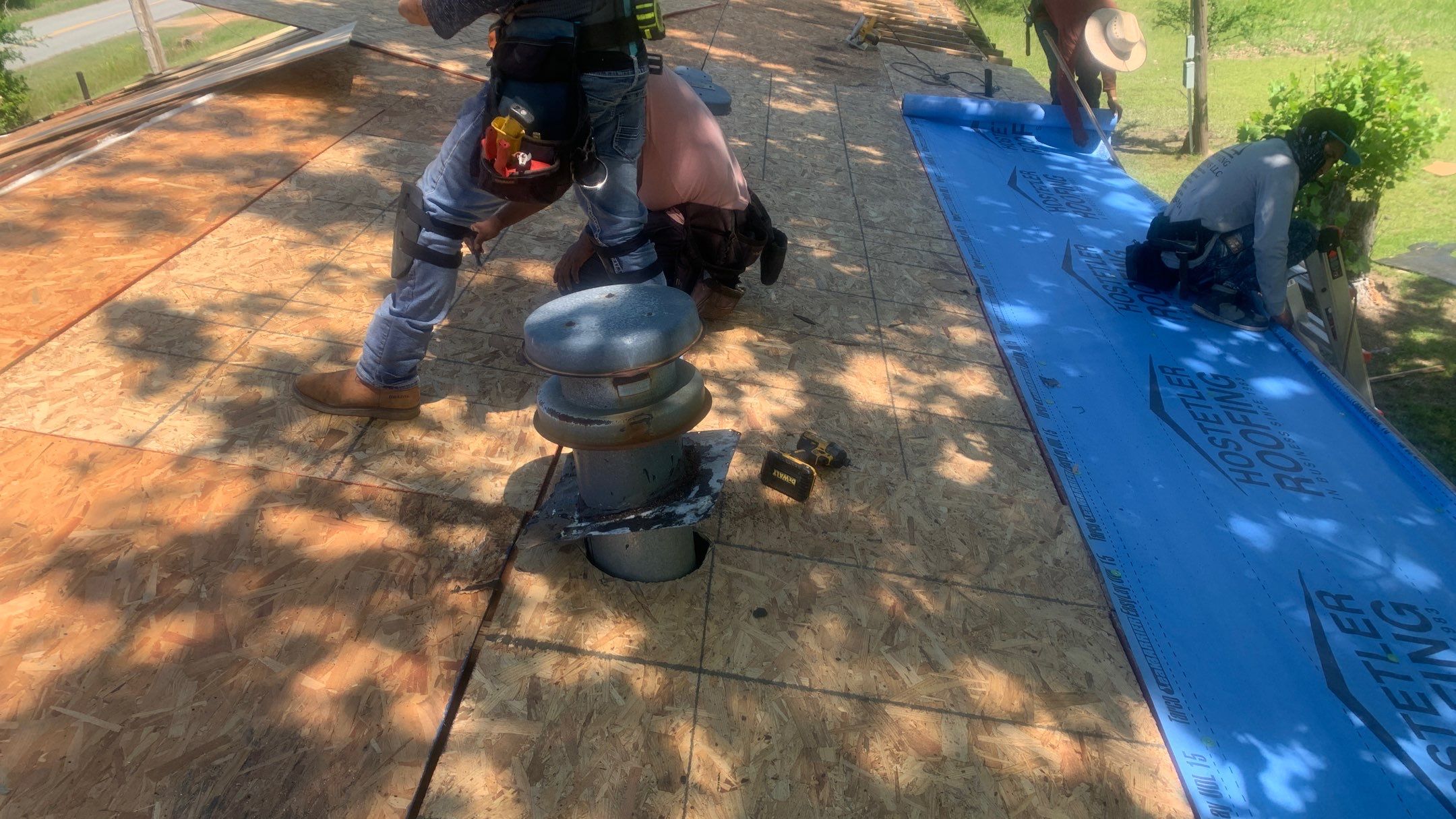 Storm Restoration Reroof: 25 Year 3-Tab Shingle by Hostetler Roofing