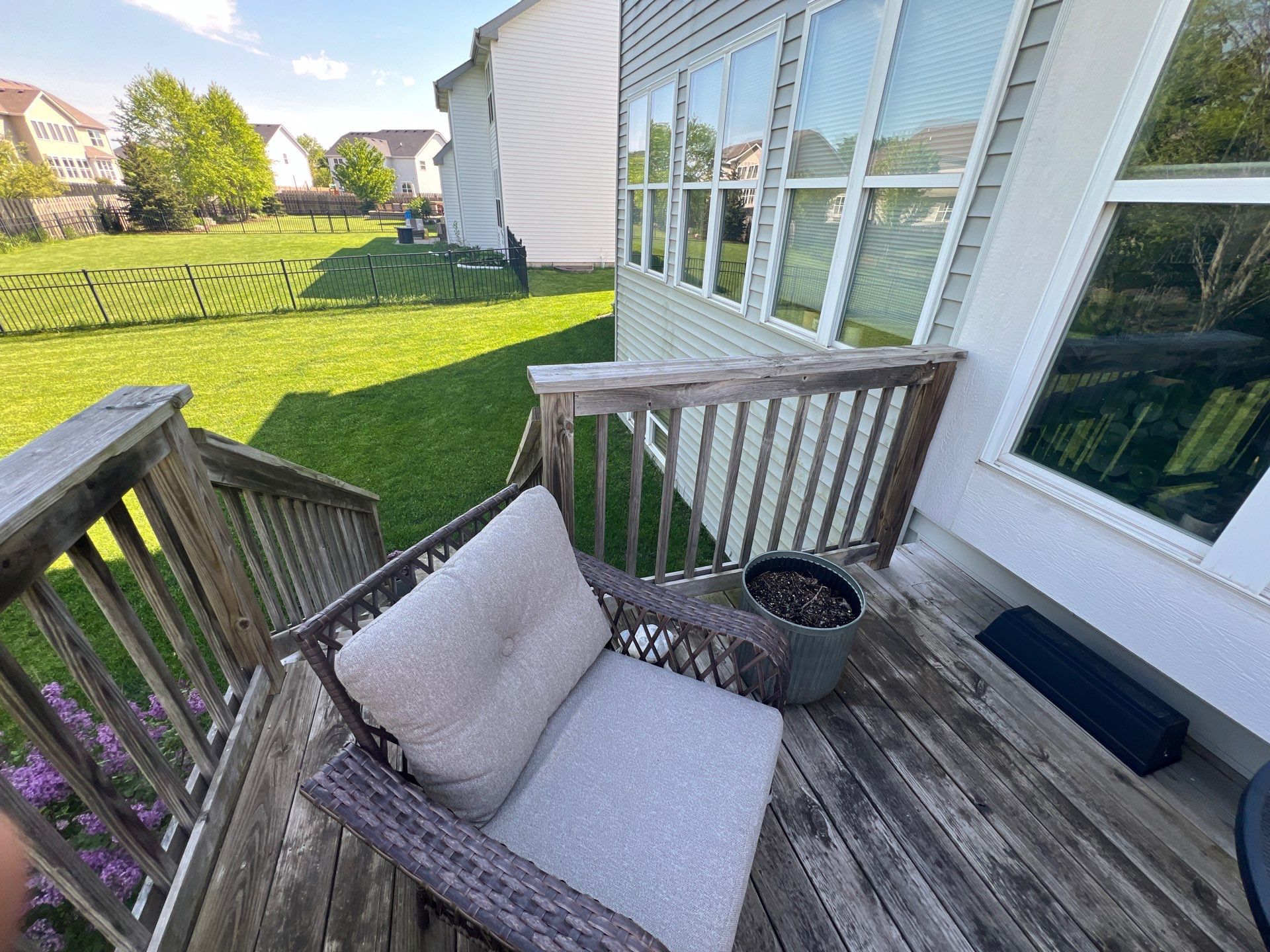 wood deck cleaning and staining by Northern Power Washing LLC.