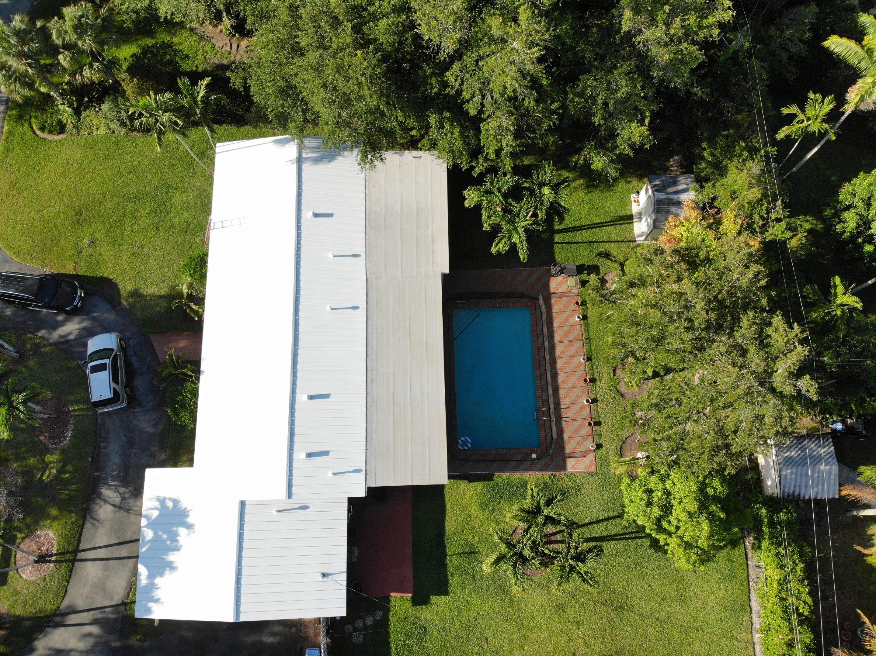 Metal Roof - Galvalume Regal White by Istueta Roofing