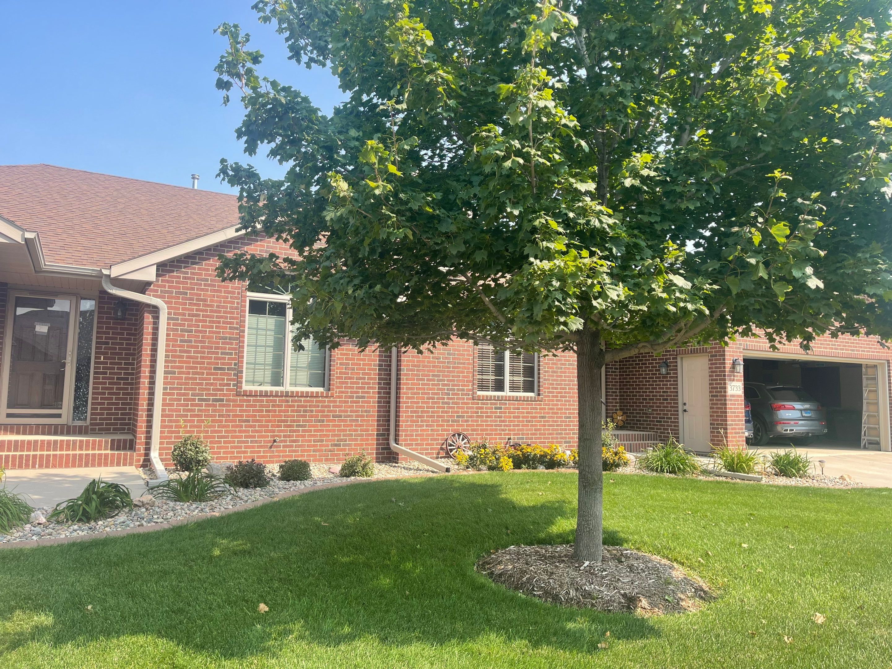 Residential Exterior Siding and Trim Painting in Sioux Falls by Select Painting, Coatings & Garage Cabinets