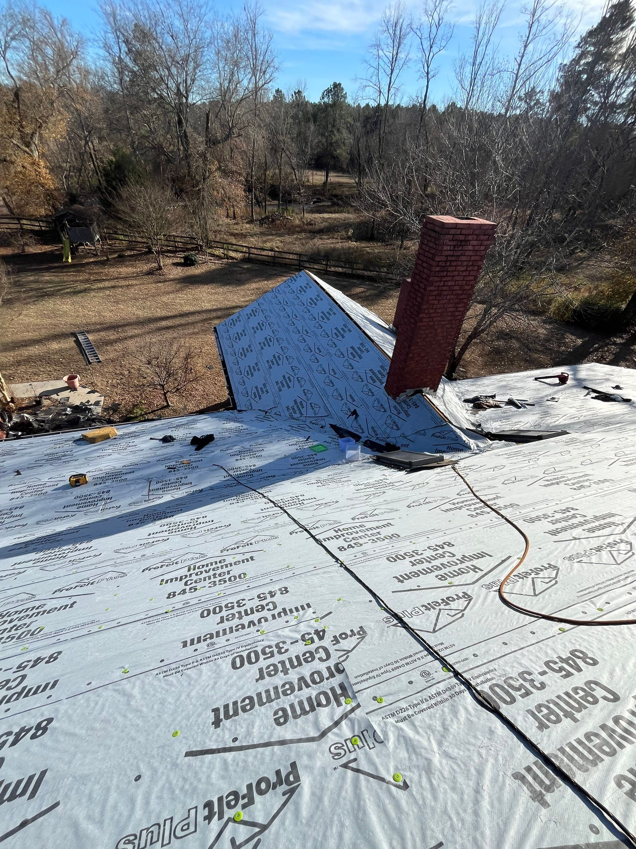 Residential Roofing Repair using CertainTeed XT25: Moire Black by Hostetler Roofing