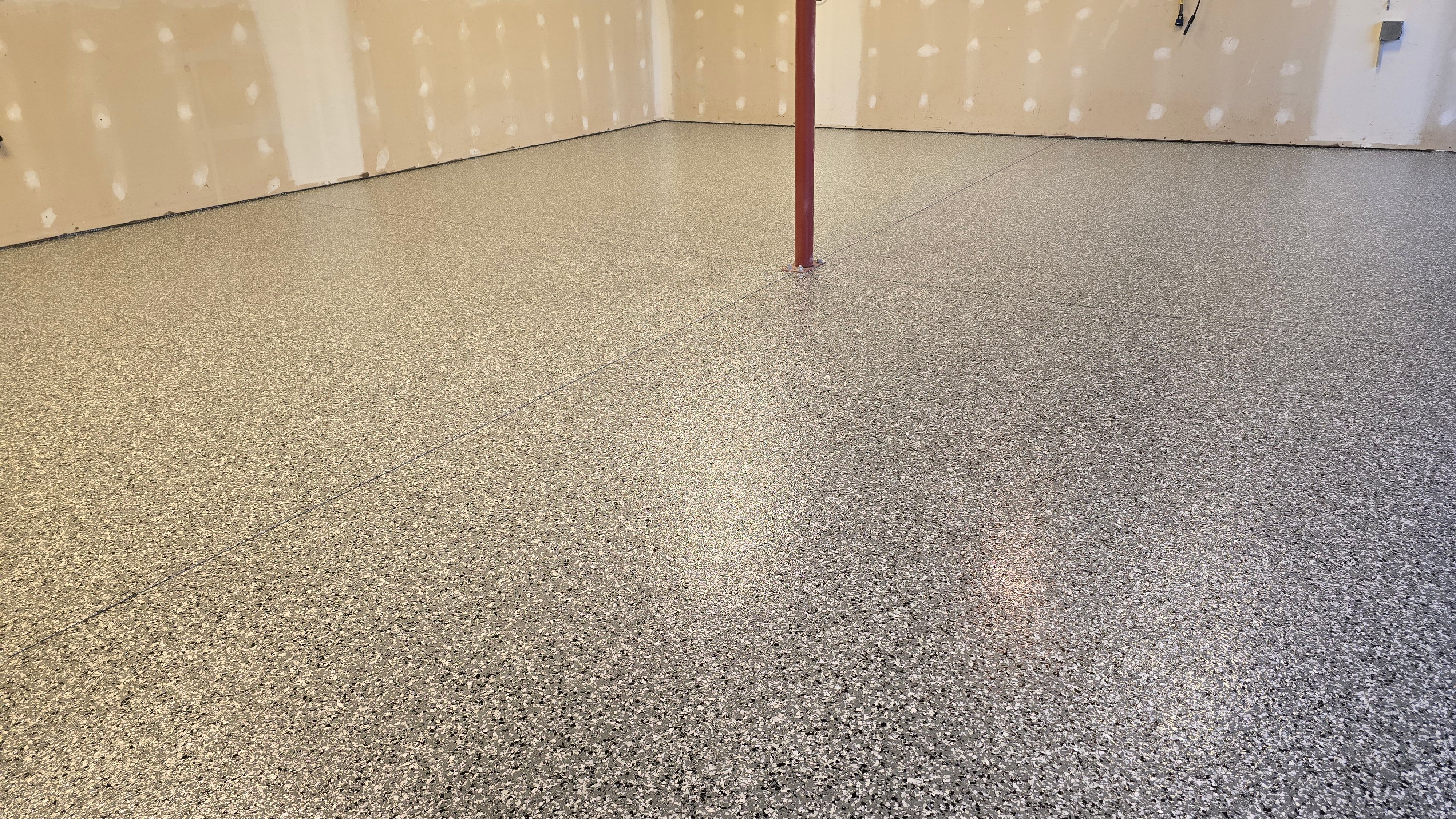 Garages, Basement & Patio Using Wombat & Obsidian by Elite Floor Solutions