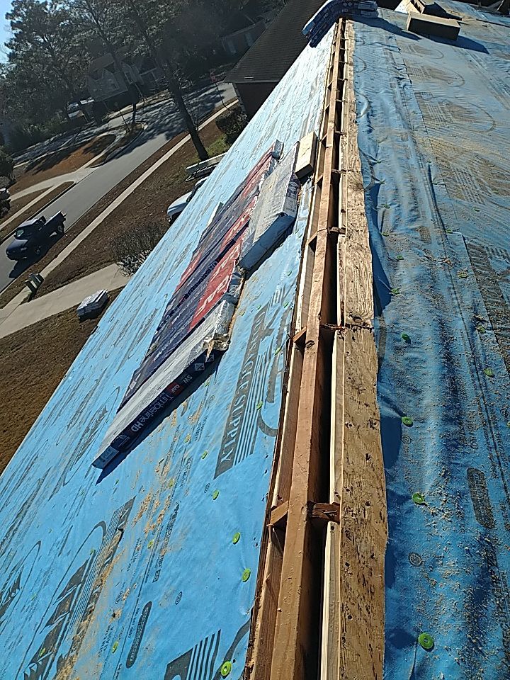 Residential Roofing Installation using Roof Replacement by American Roofing & Construction LLC