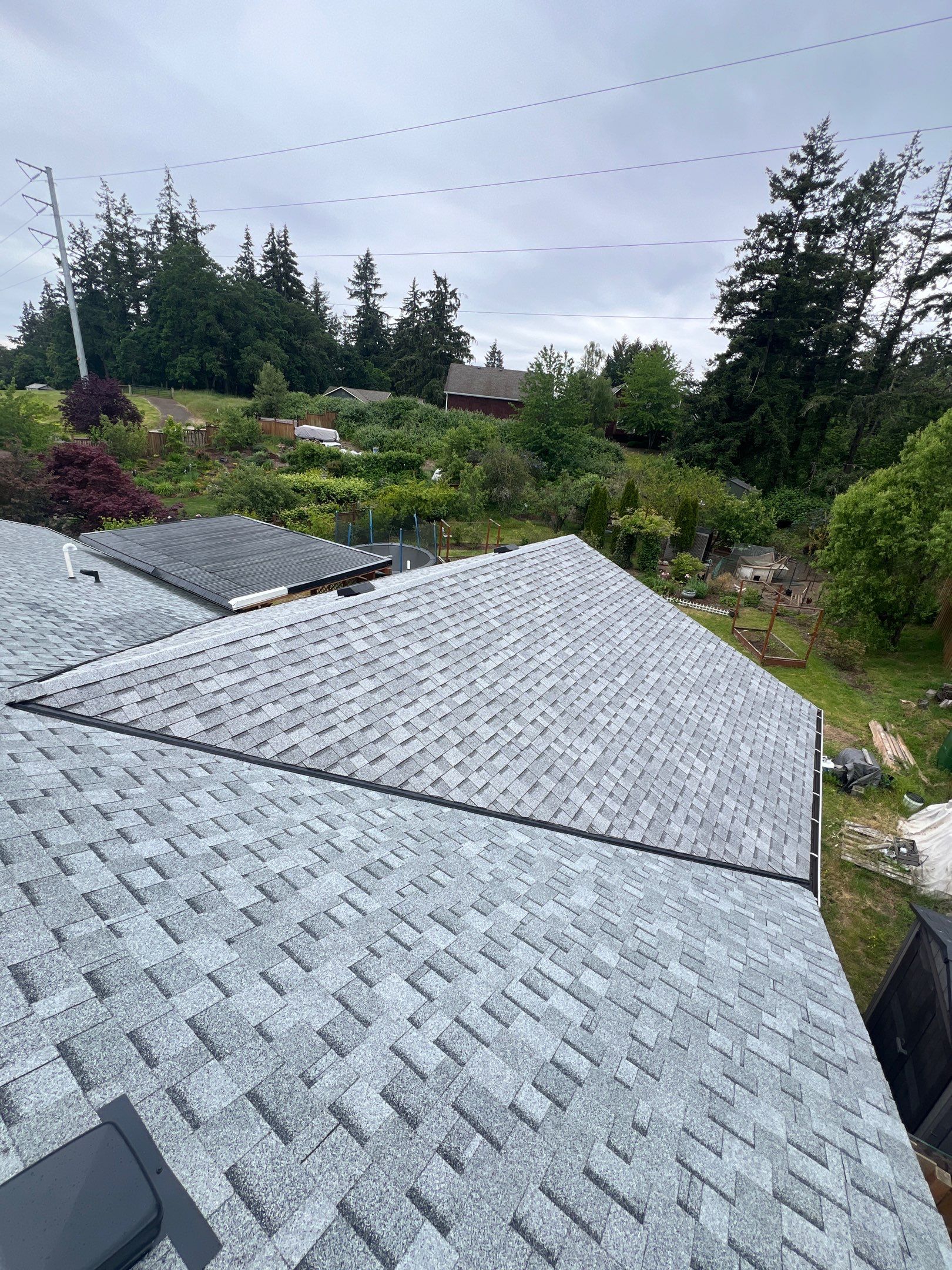 Residential Roofing Installation using IKO Cambridge (Color: Dual Grey) by Orezona Building & Roofing Company, Inc.