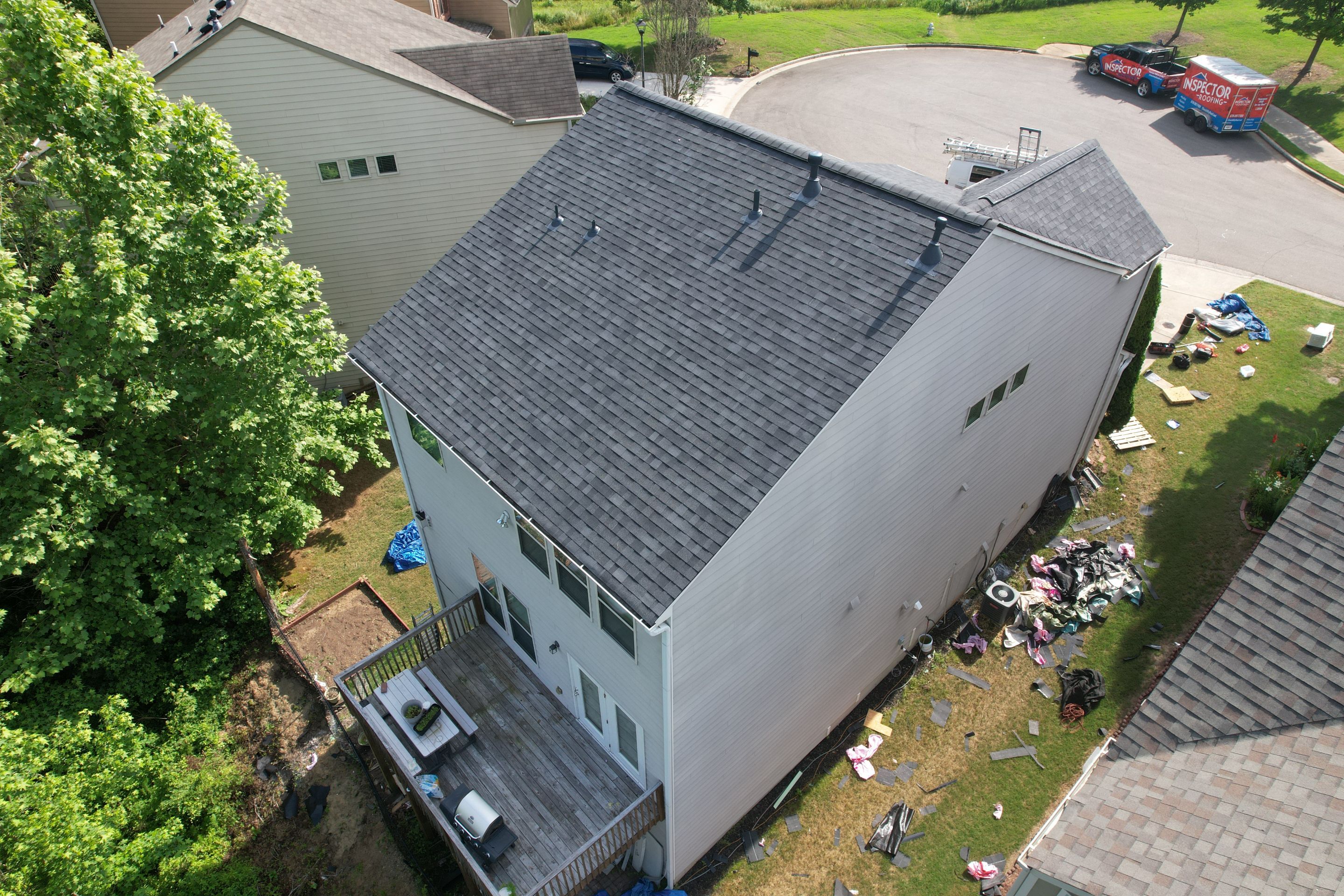 Residential Roof Replacement using Owens Corning Trudef Twilight Black by Inspector Roofing and Restoration