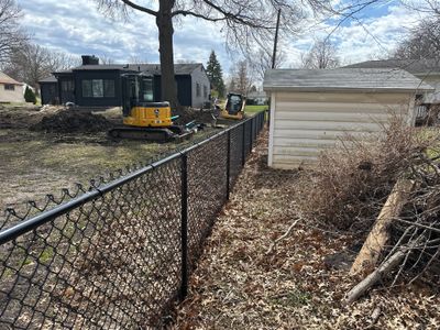Black Vinyl-Coated Chain Link Fence Installation in Cedar Falls