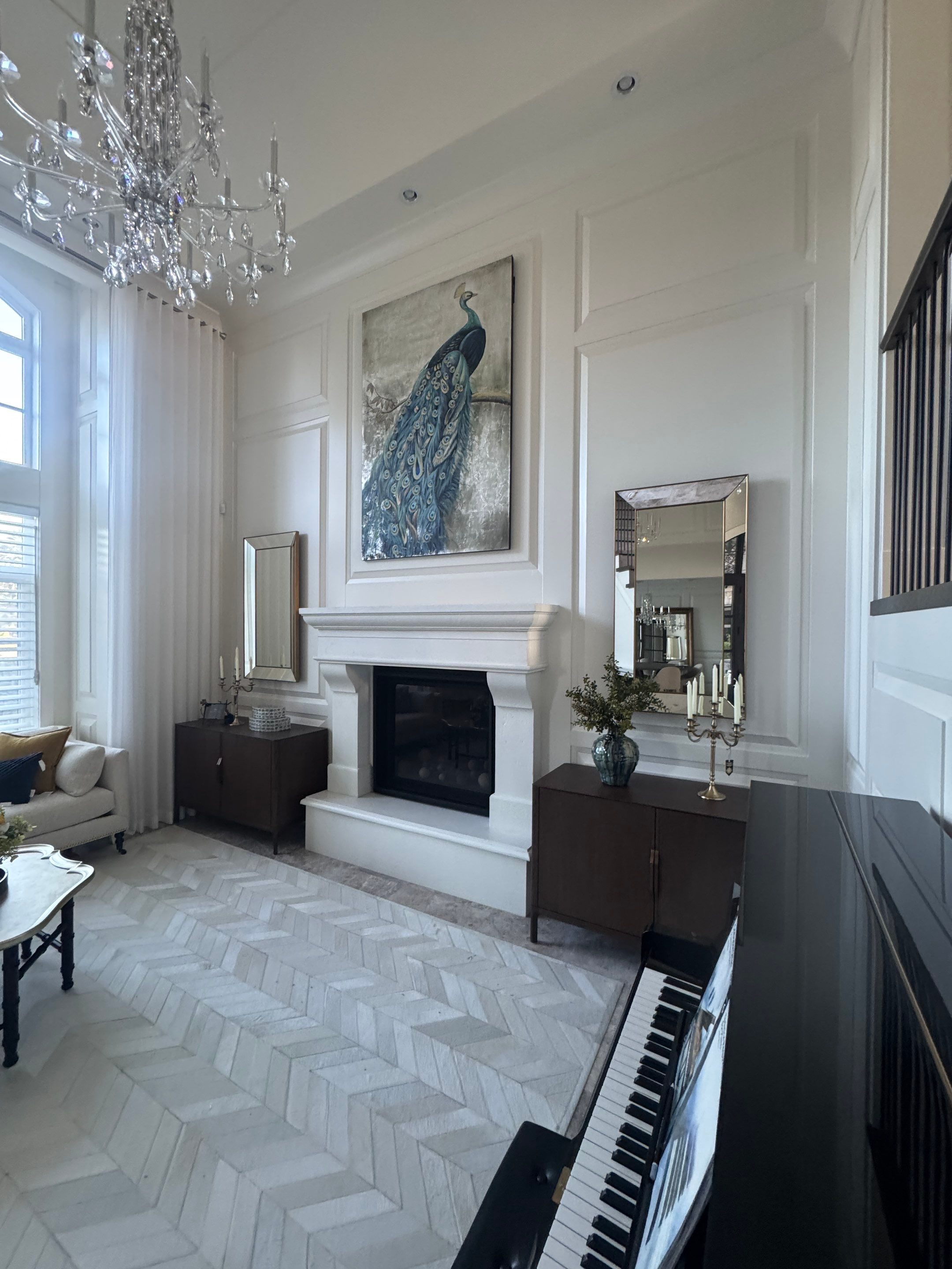 Professional Hanging of Mirrors & Art in a Designer Home by YVR Construction Group