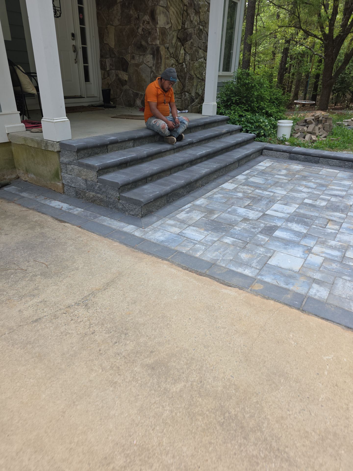 Pittsboro Outdoor Living Transformation – Retaining Wall, Paver Patio & Elevated Deck by Elite Remodeling and Design LLC