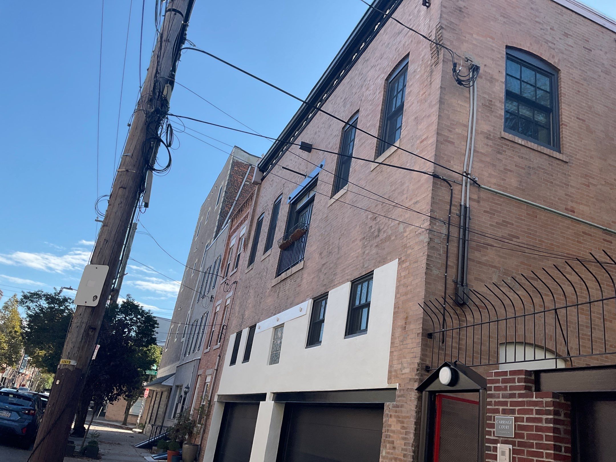 Exterior Refresh at Carriage Court Condominiums in Queen Village  by Groovy Hues