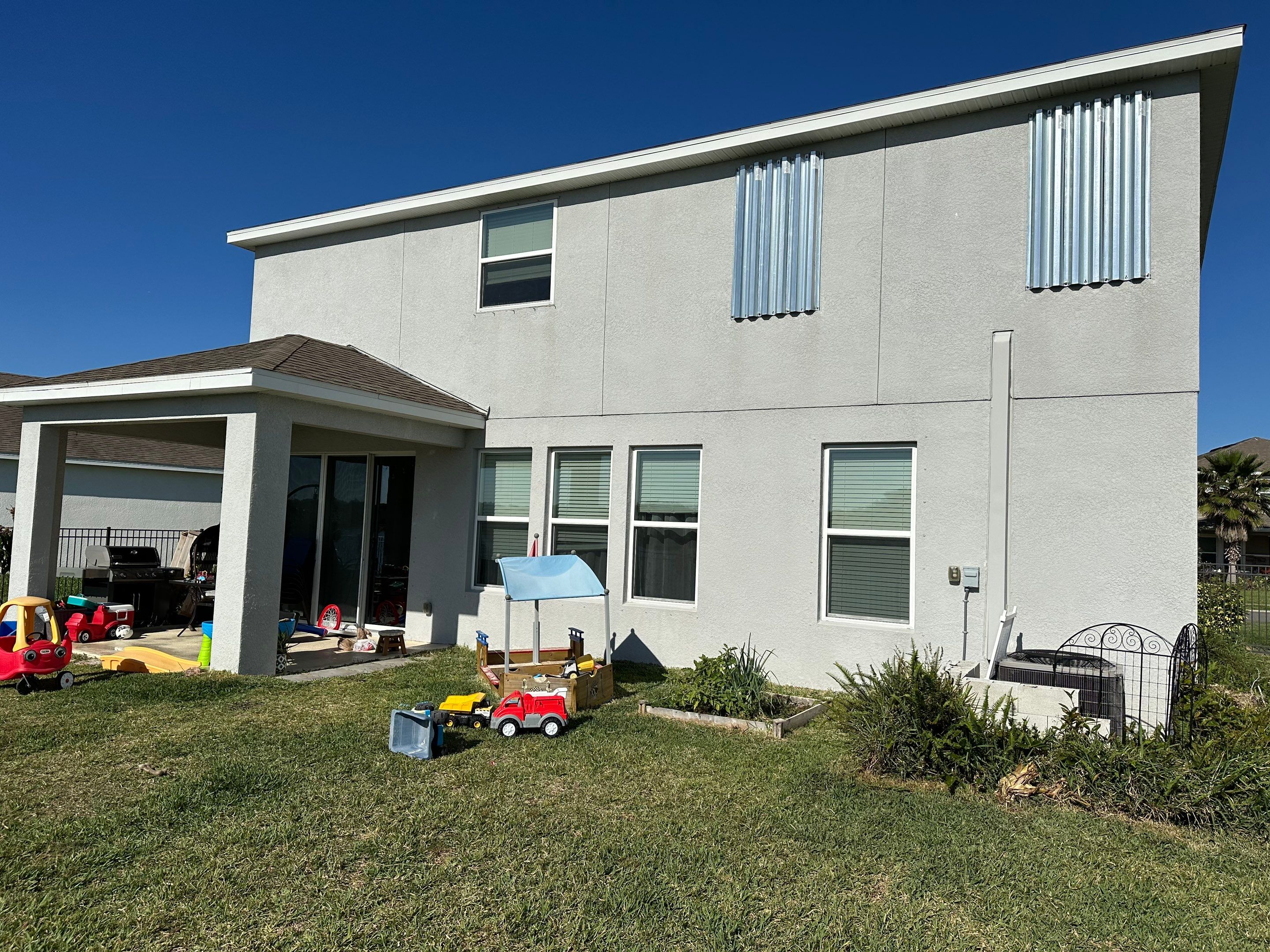 2-Story House Wash & Paver Driveway Cleaning in Trevesta Community, Palmetto, FL | Sunshine AquaWash by Sunshine AquaWash