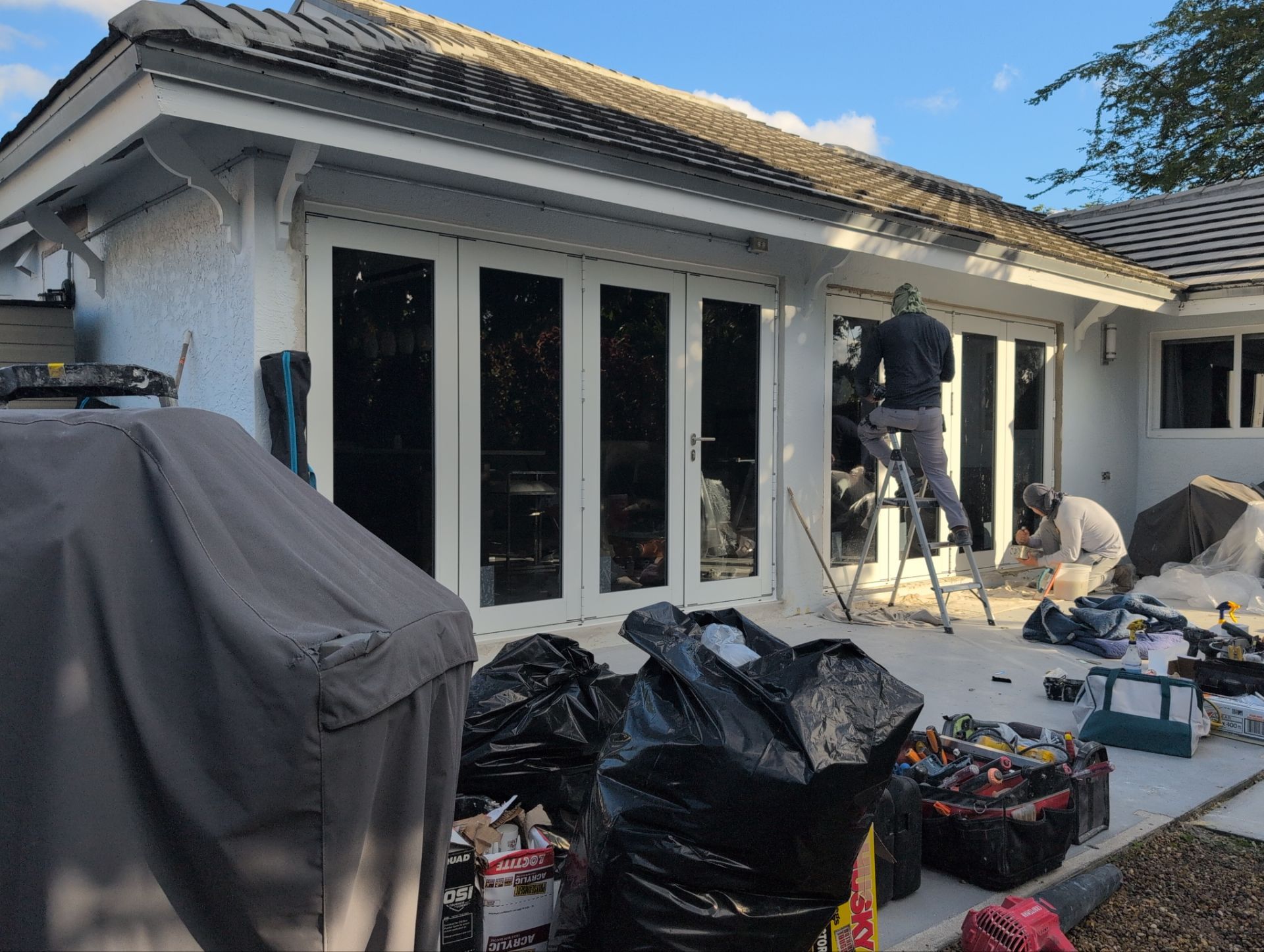 Impact Window and Door Replacement using Bi-Fold Doors by ASP SuperHome