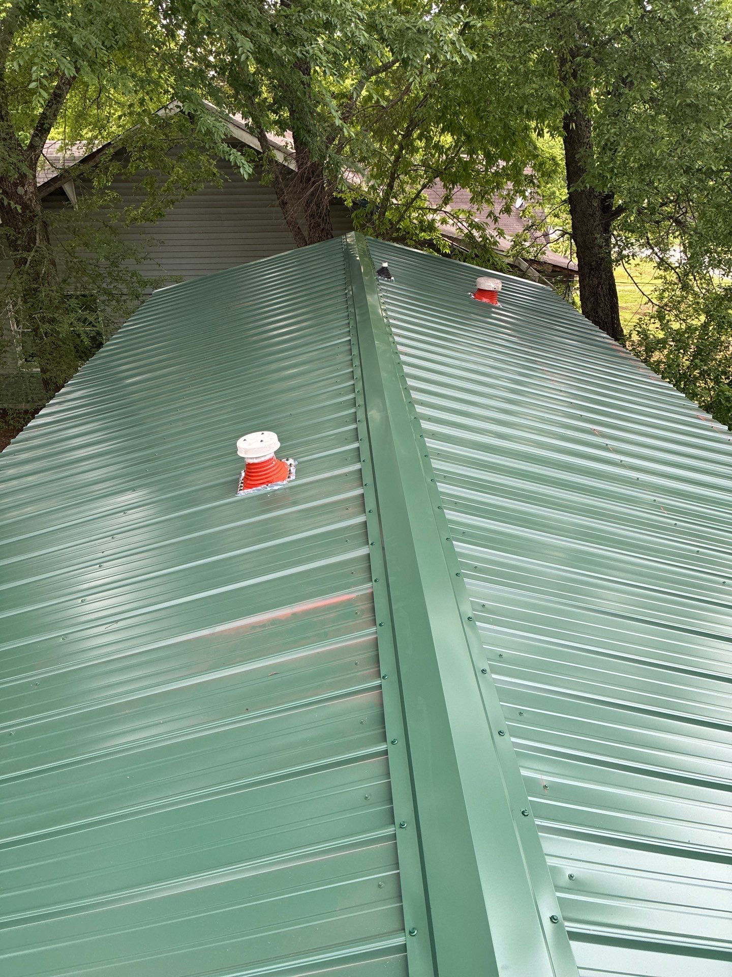 Metal roof installation by In & Out Construction & Remodeling, LLC