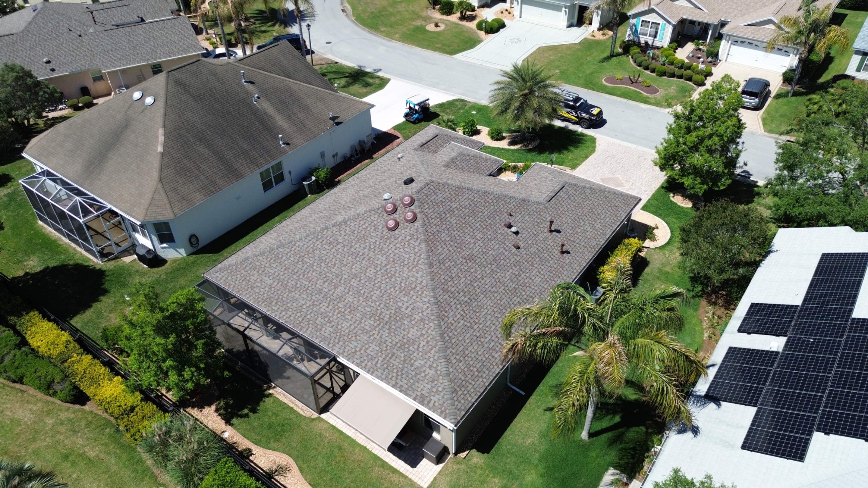 Before and after drone pictures in The Villages FL by Gold Key Roofing