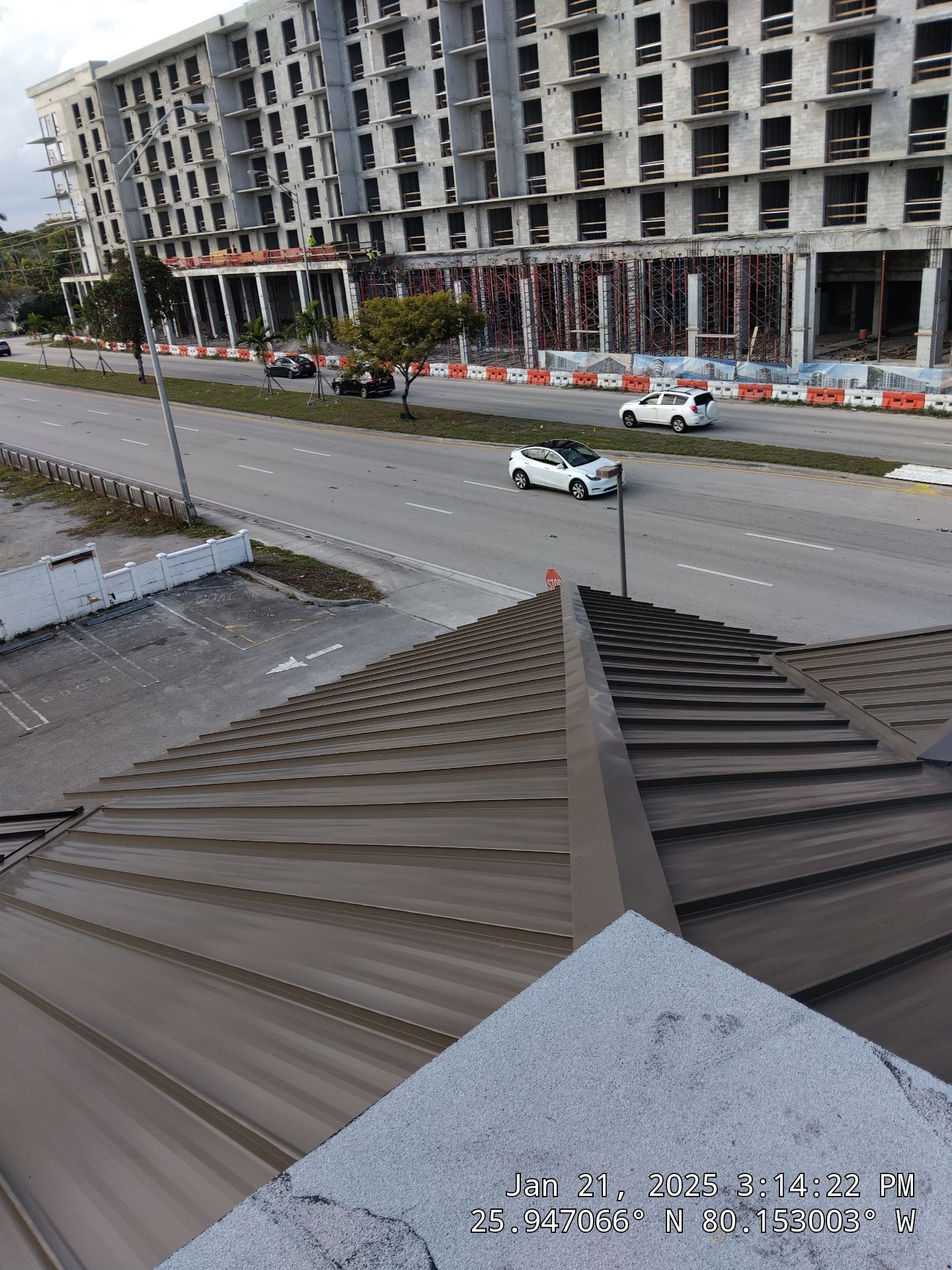 COMMERCIAL REROOF 24 GUAGE MEDIUM BRONZE 1-1/2" MECHANICAL SEAM "ZEBRA METHOD" by Earl W. Johnston Roofing 