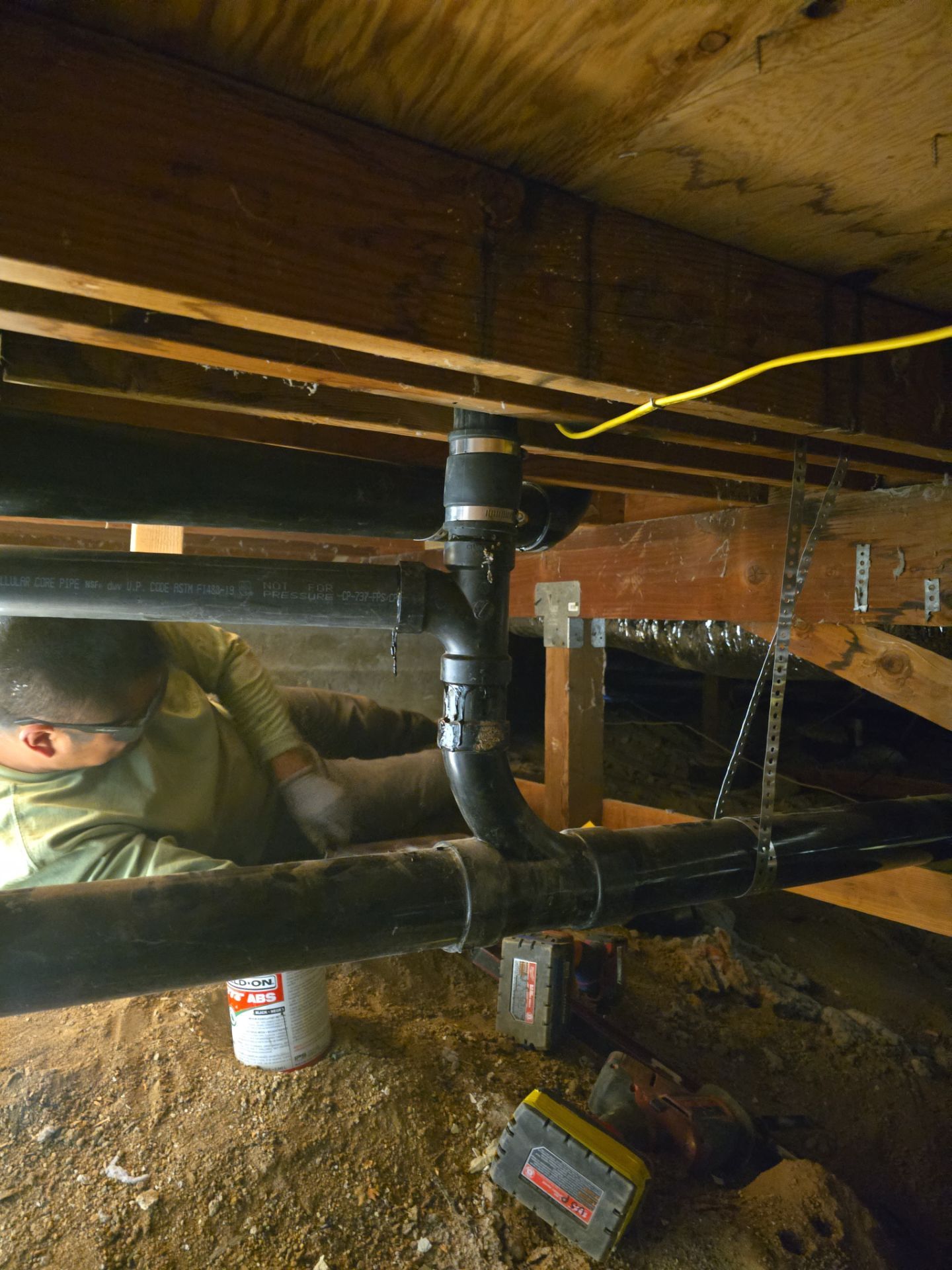 Installation of New Tall Black Piping (Wall to Ceiling) & Underground Piping by Us Plumbing