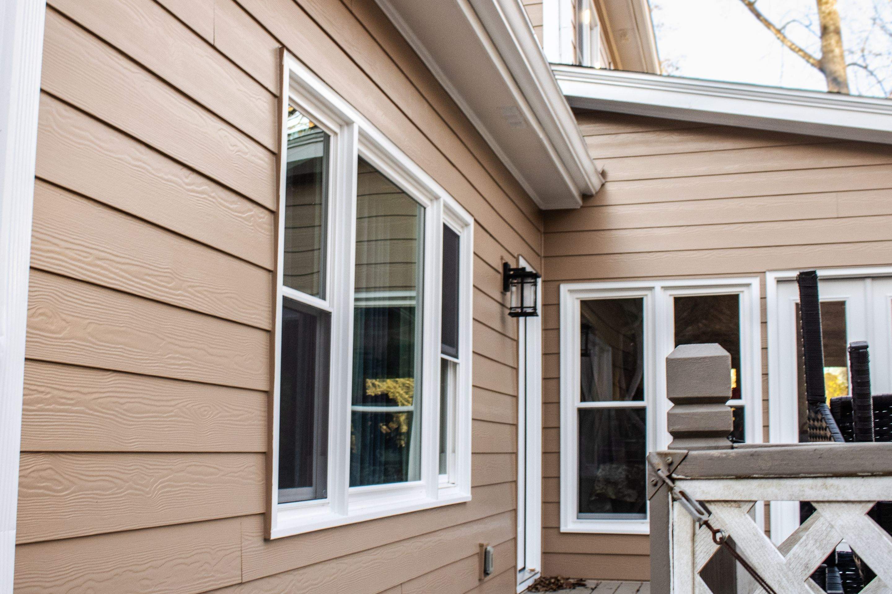 53 Window Replacements with Master 2800 Series Vinyl Replacement Windows and James Hardie Siding Installation by Nelson Exteriors 