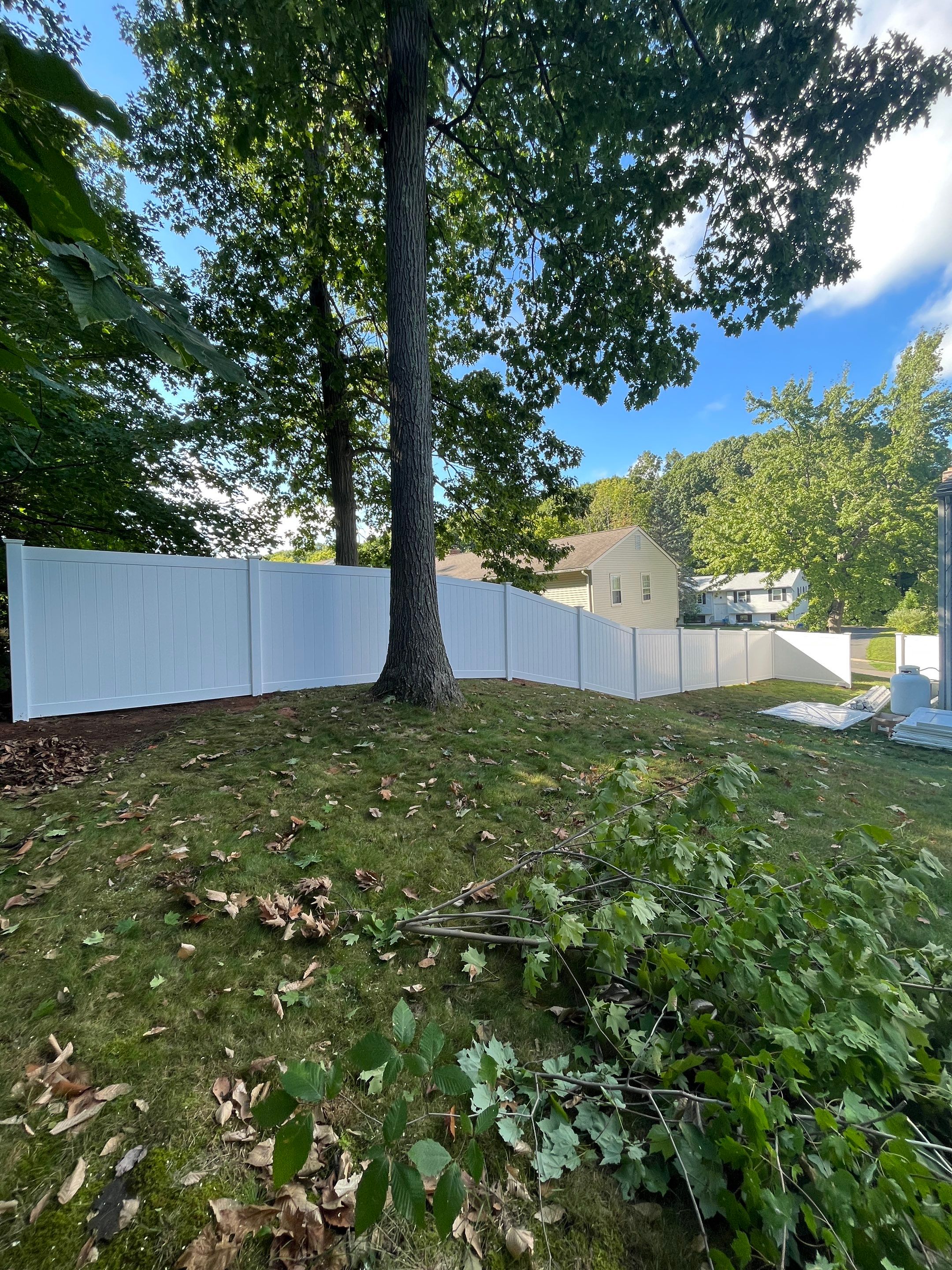 New Vinyl Privacy fence in White with matching gate by DiGiorgi Roofing and Siding Inc
