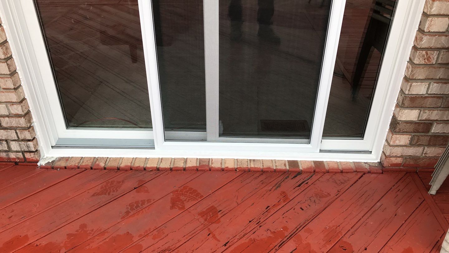 Deck Refurbush and Door Replacement using Trex Decking and Railing. Polaris Patio Doors by Secure Construction Company Inc