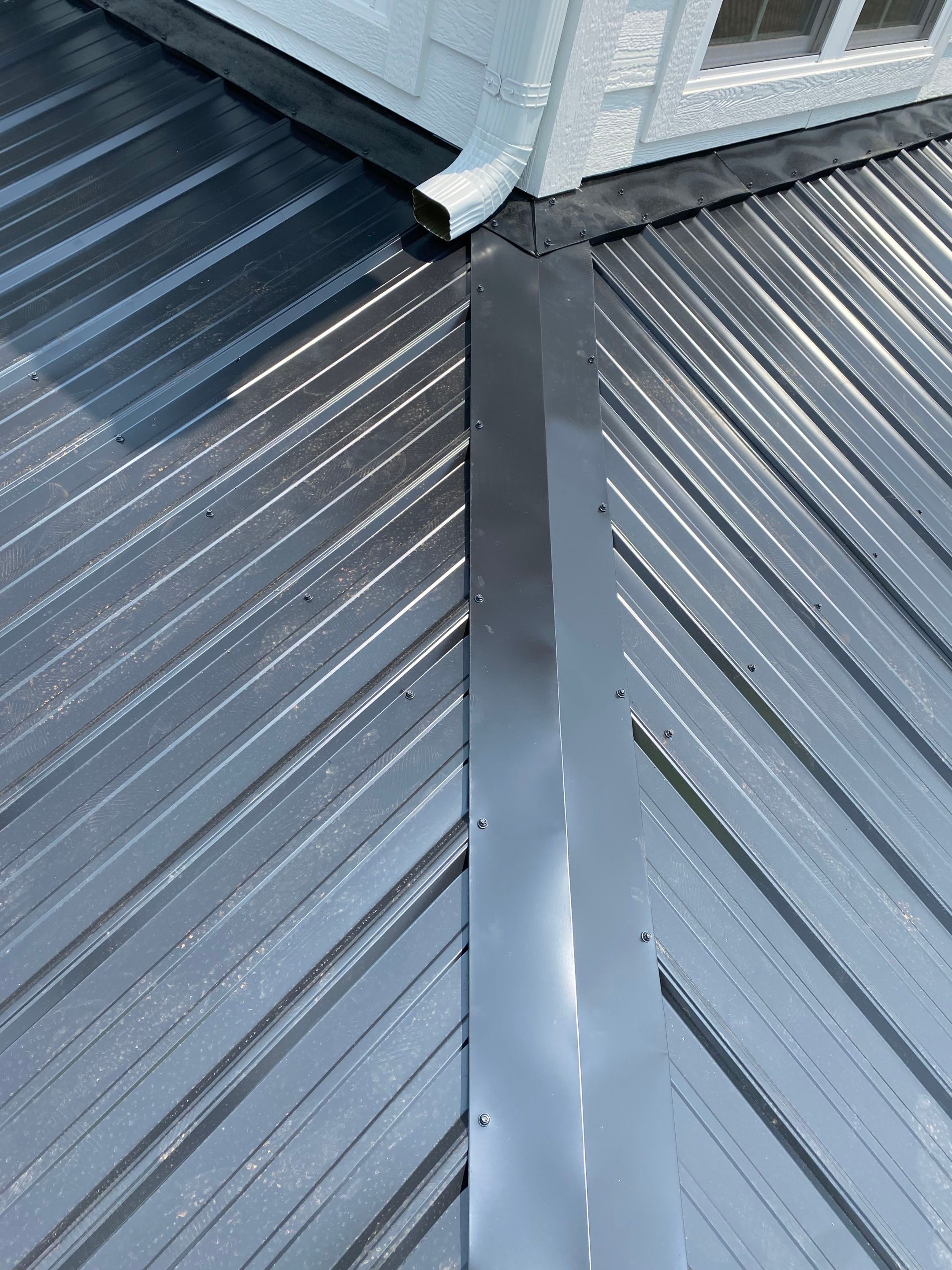 Jason's metal porch roof by BROCK BUILDERS 