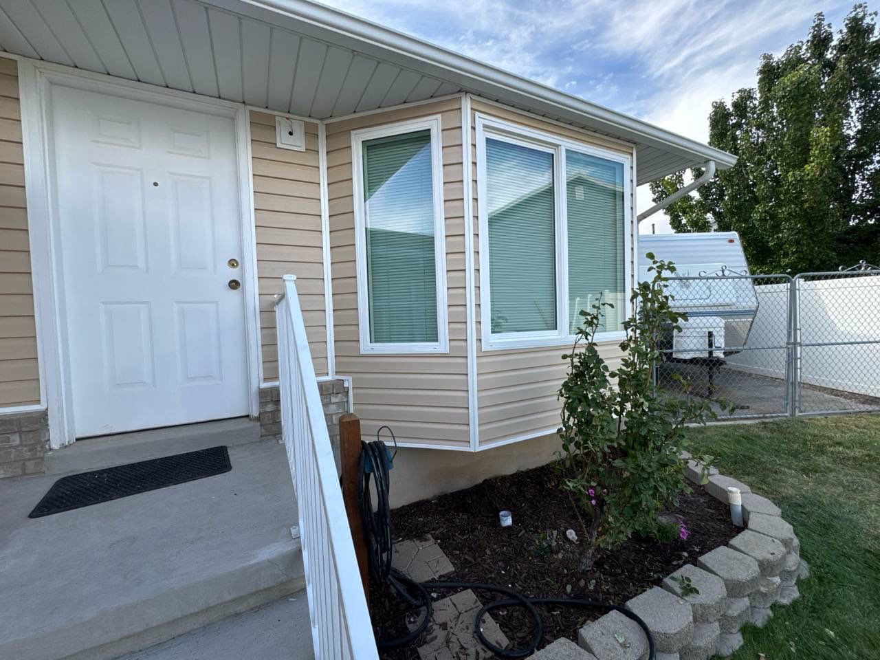 West Jordan | Mastic Vinyl Siding Update | Sandtone & White by Ideal Siding Utah