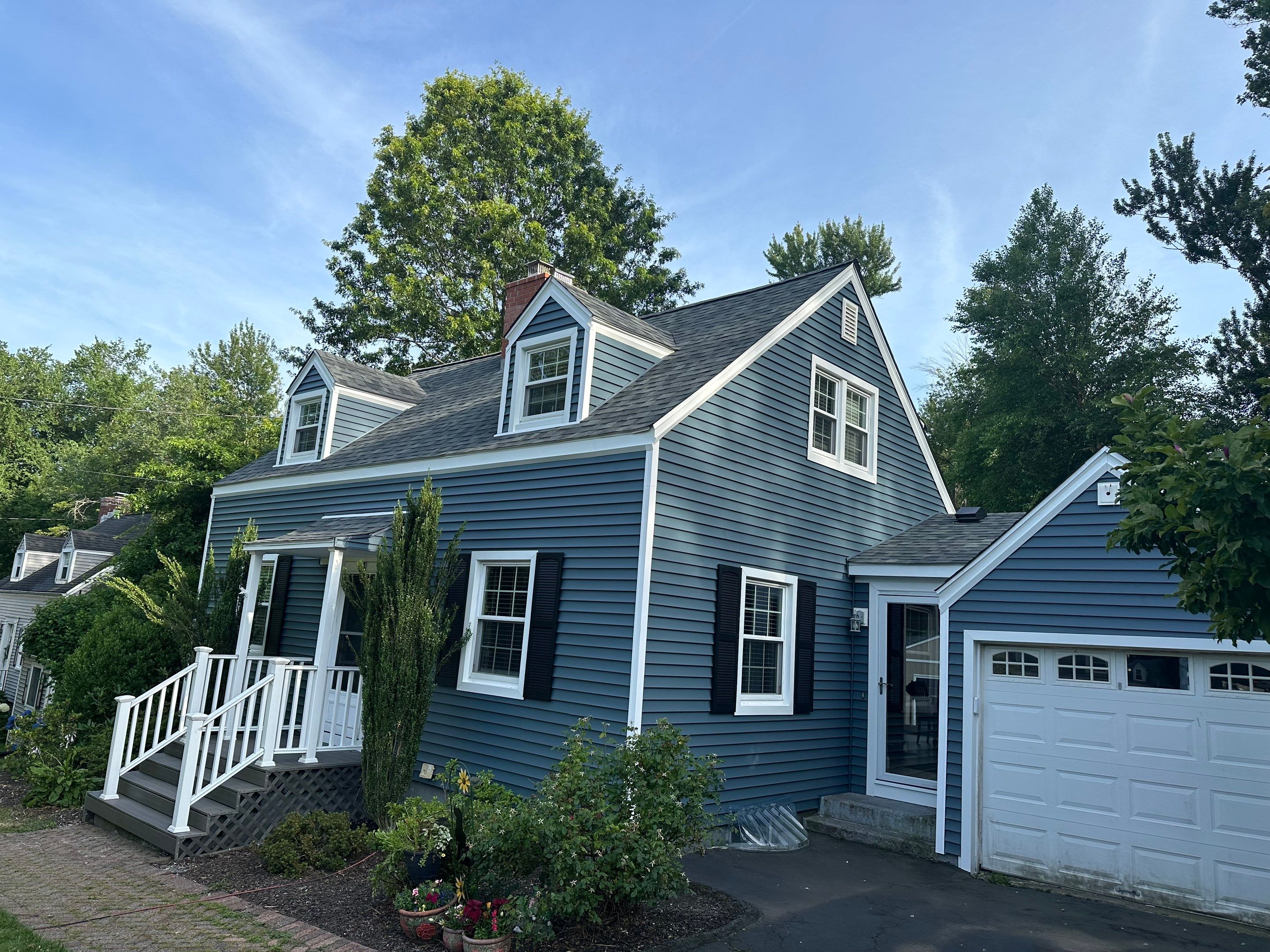 Complete Exterior Estate gray with Pacific Blue Siding by A Plus Exterior