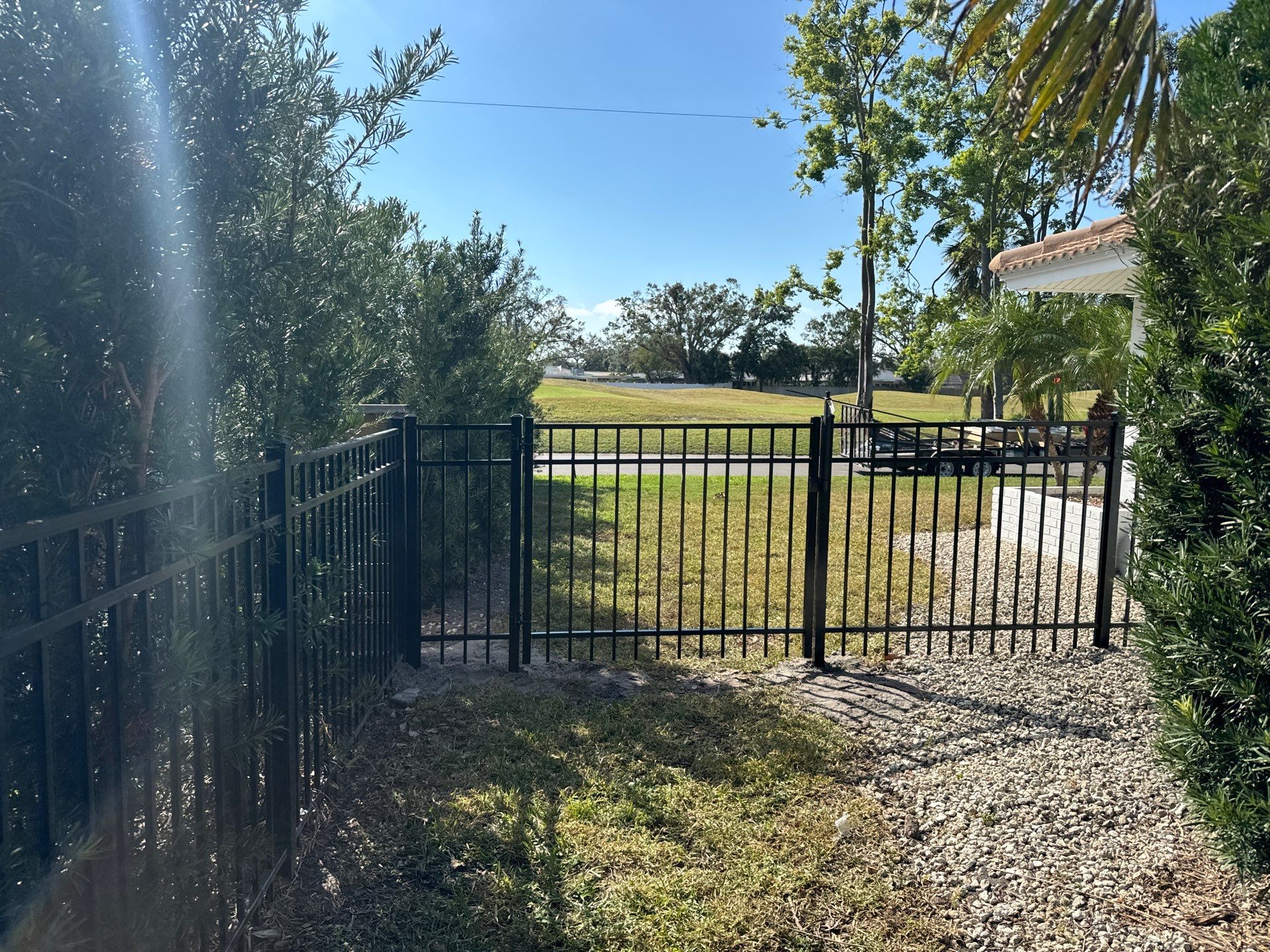 Aluminum Fence Installation using 3 Rail 4Ft Black Aluminum and 4Ft White Vinyl Fence by Asap fence and gates, LLC