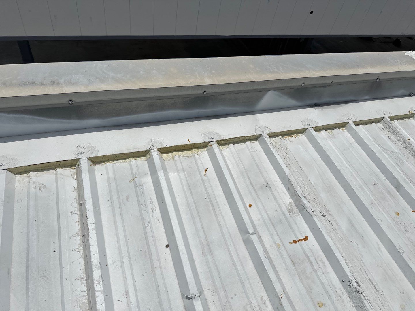 Commercial Roofing Repair using Metal by Roof Repair Company