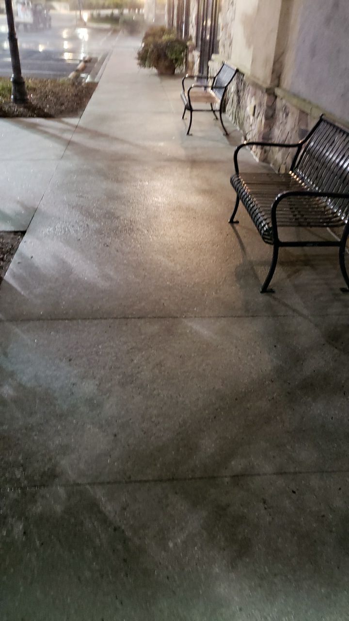 contrete cleaning using cleaner by Power Wash Masters LLC