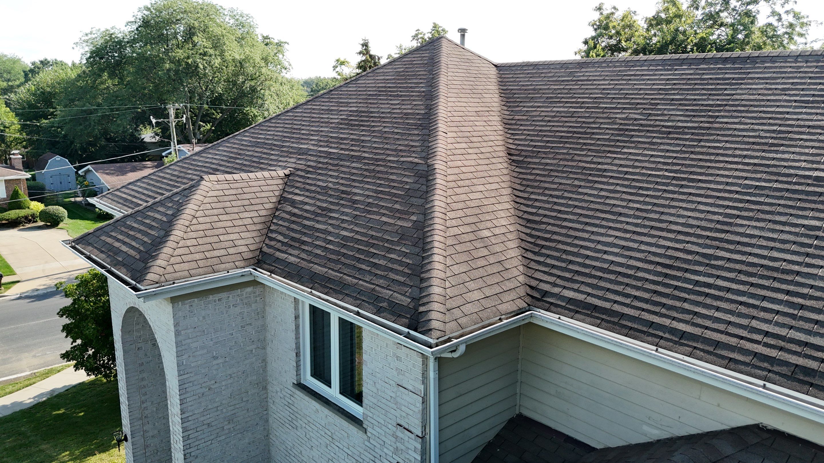 Roof and windows by Optimal Home Improvement 