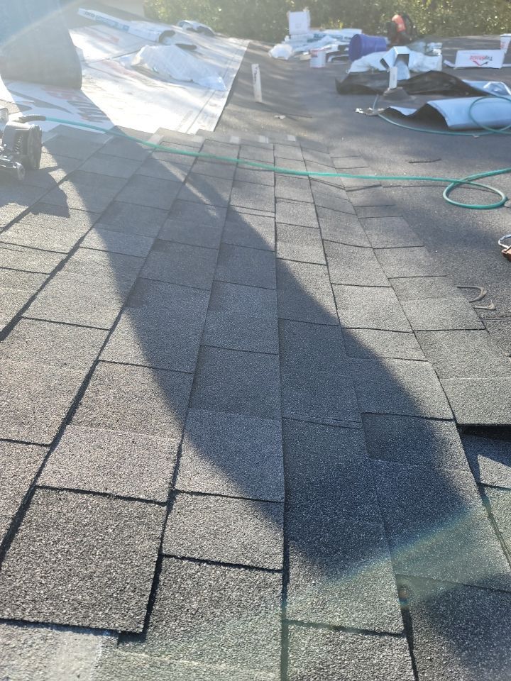 Residential Roofing Installation using Roof Replacement by American Roofing & Construction LLC