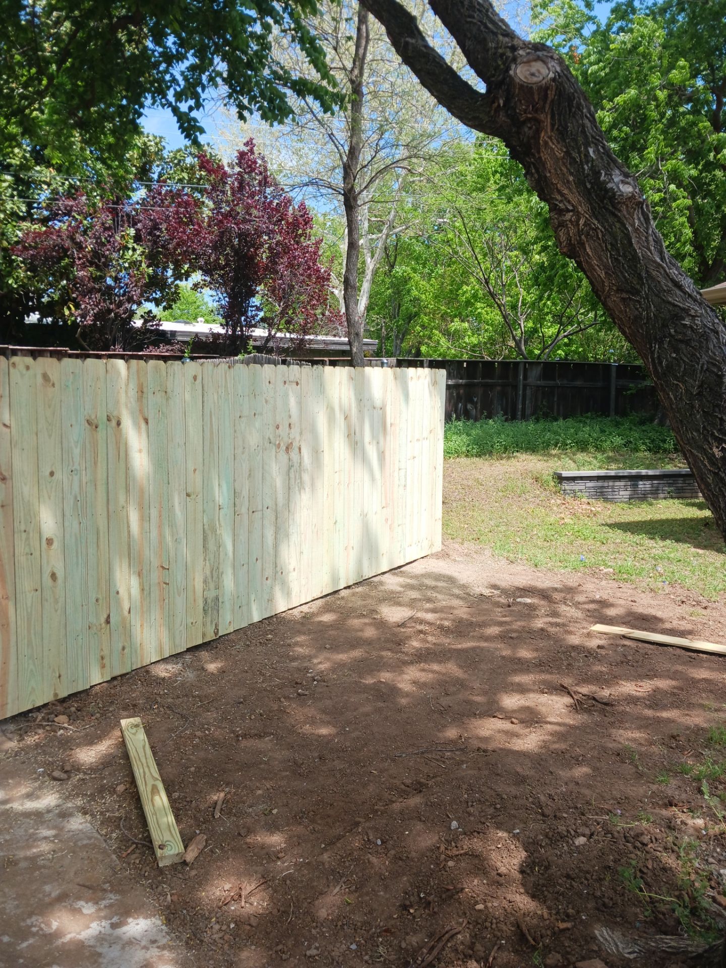 Concrete Driveway and Fence by Clays Services Inc