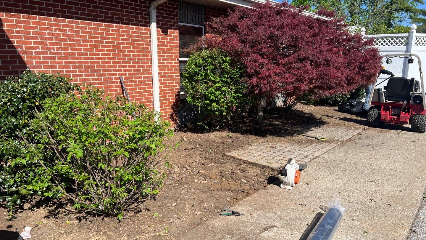 River rock installation using River Rock by GrassBusters, Inc.