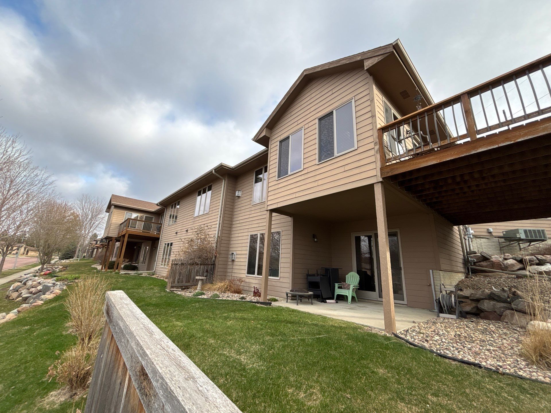 Multi-Story Residential Exterior Painting and Siding Refresh in Sioux Falls by Select Painting, Coatings & Garage Cabinets