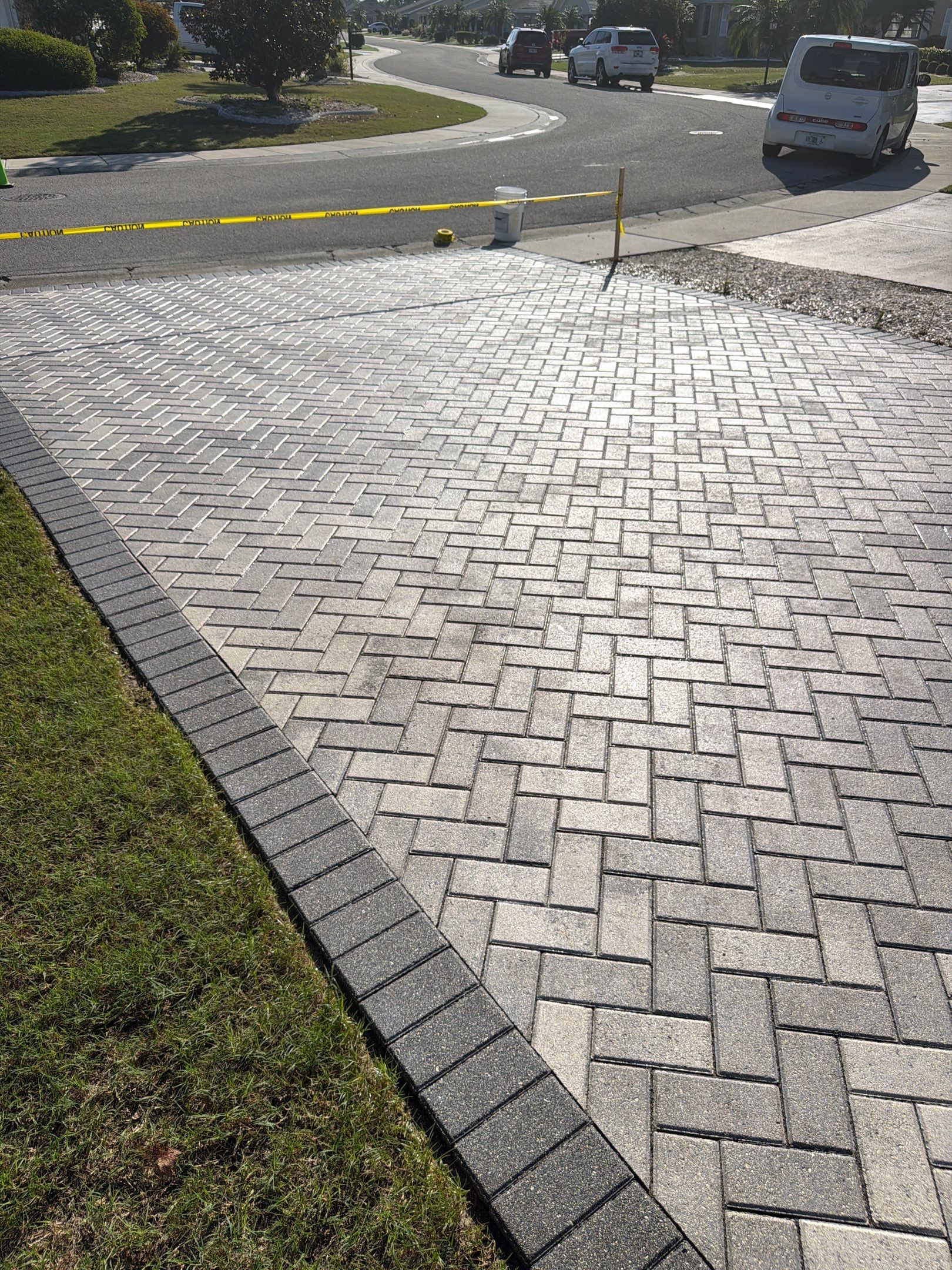 Paver Sealing and Cleaning for Herringbone Driveway in Sun City Center by Supreme Paver Experts