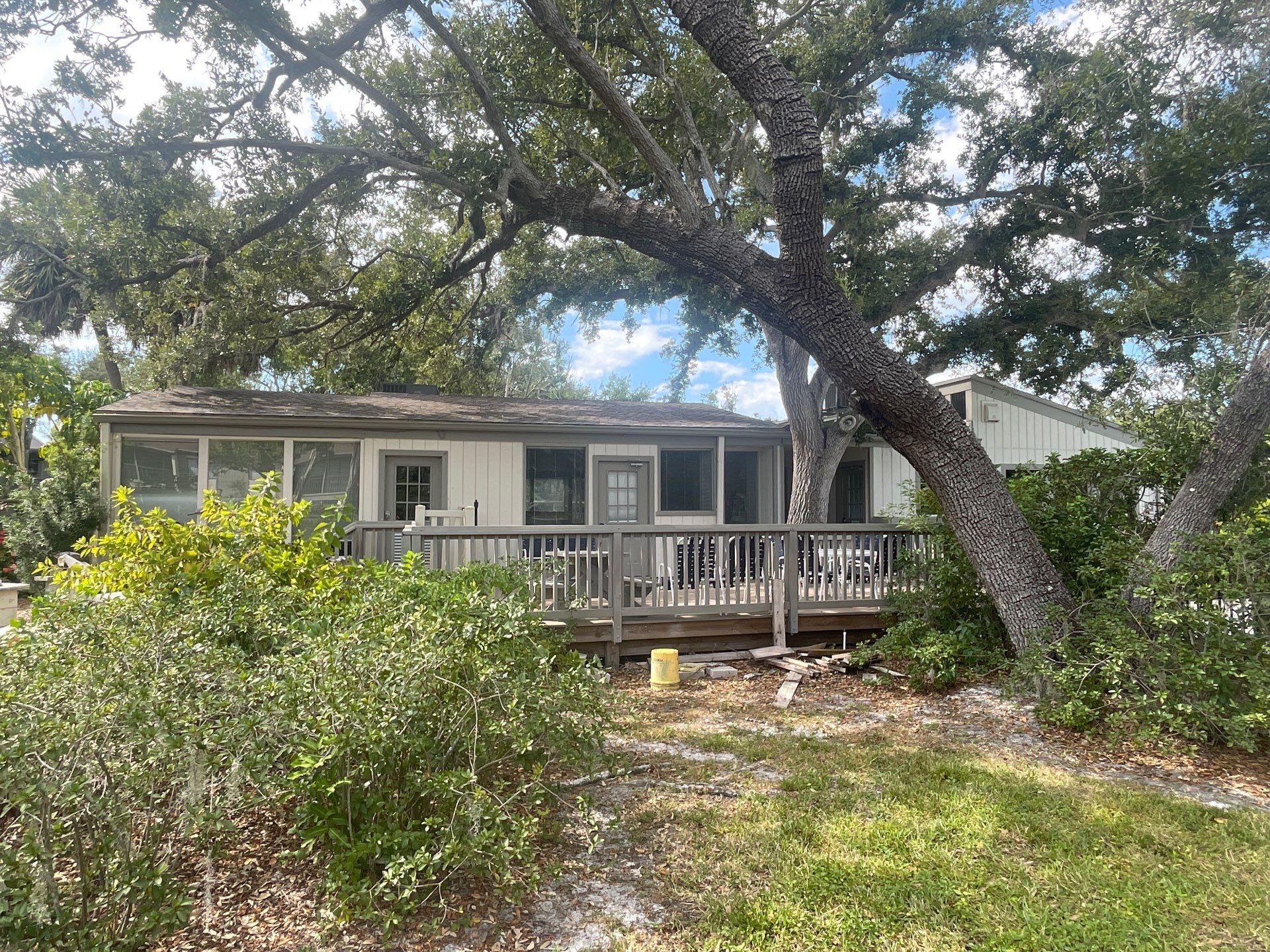 Clean Gutters and Roof in Sarasota FL by Gutter Professors