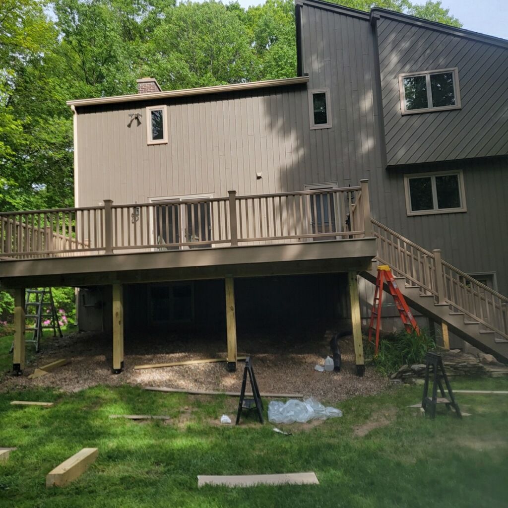 Deck Replacement using Trex Transcend Rope Swing and matching Transcend railings and trex fascia by DiGiorgi Roofing and Siding Inc