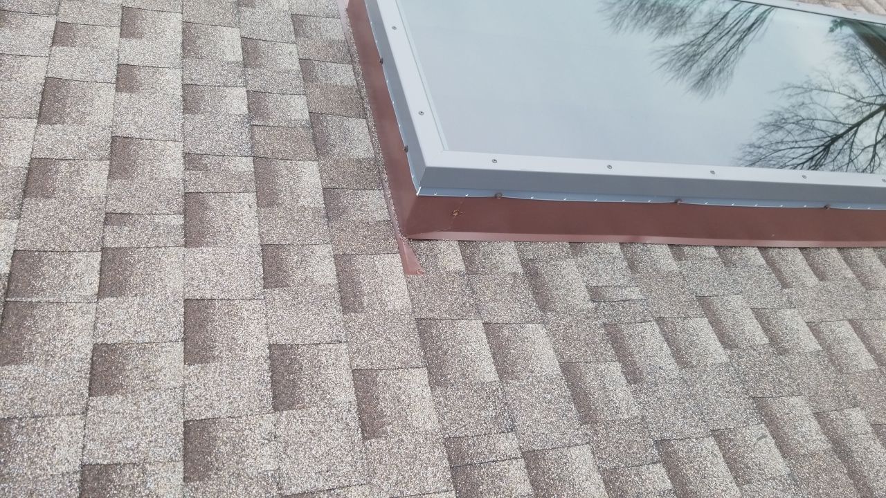 Skylight removal and install  by Absolute Roofing and Construction