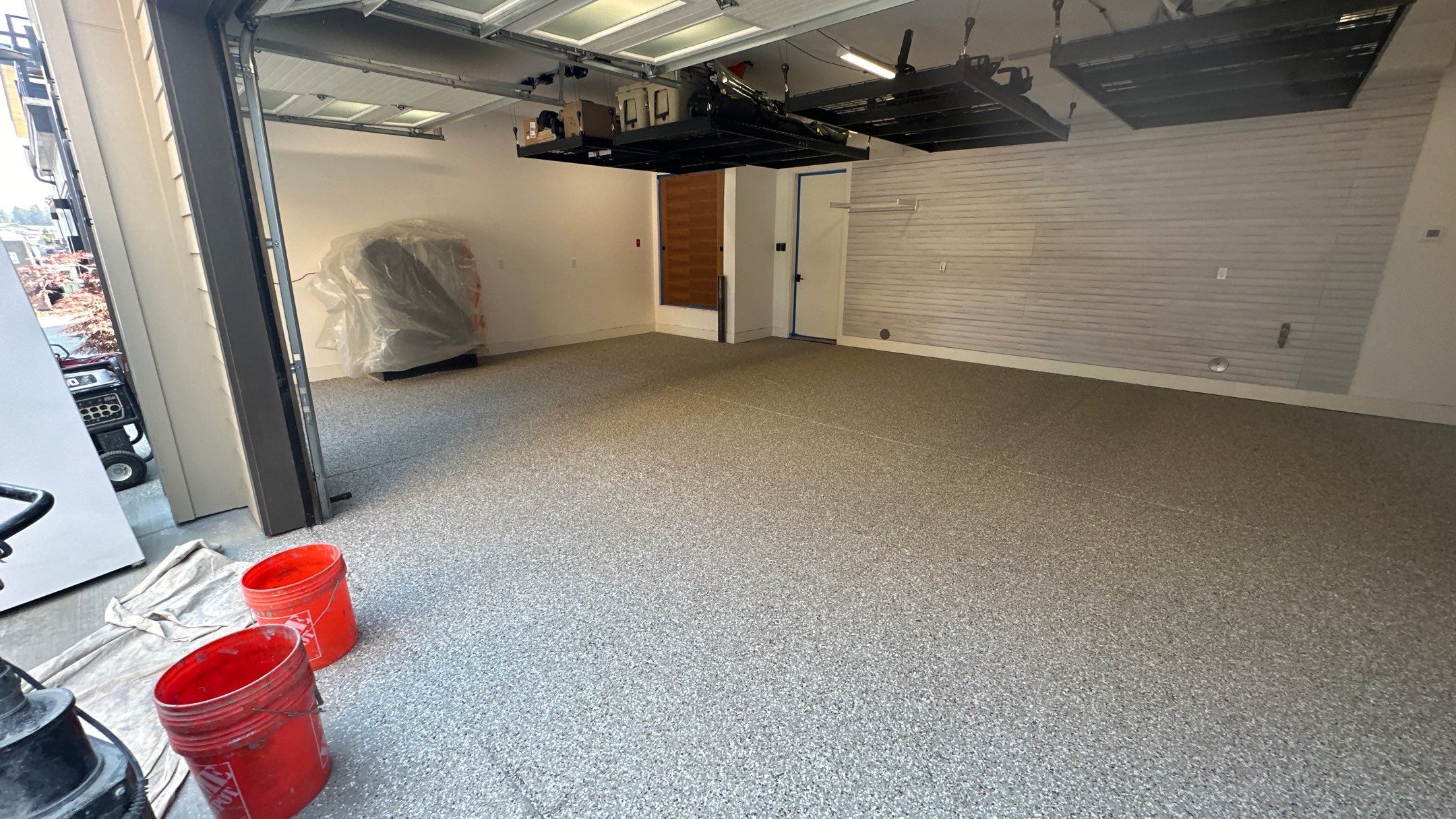 Garage Transformation using Pebble Beach by Croc Coatings, LLC