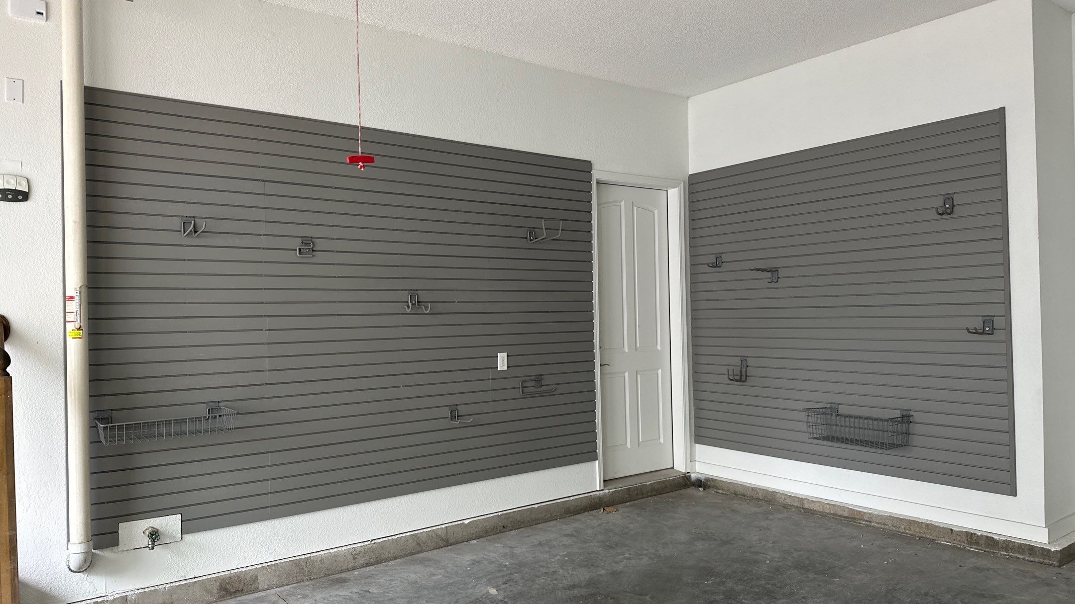 Brooke L. added cabinets for a clean storage look by Banner Garage