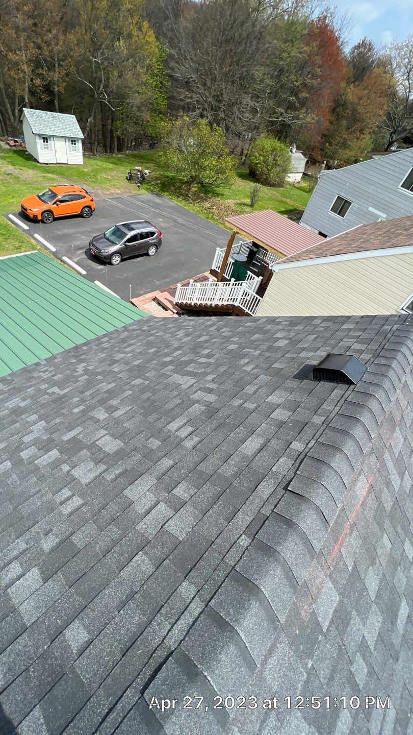 Estate Gray Shingles by Reimagine Roofing