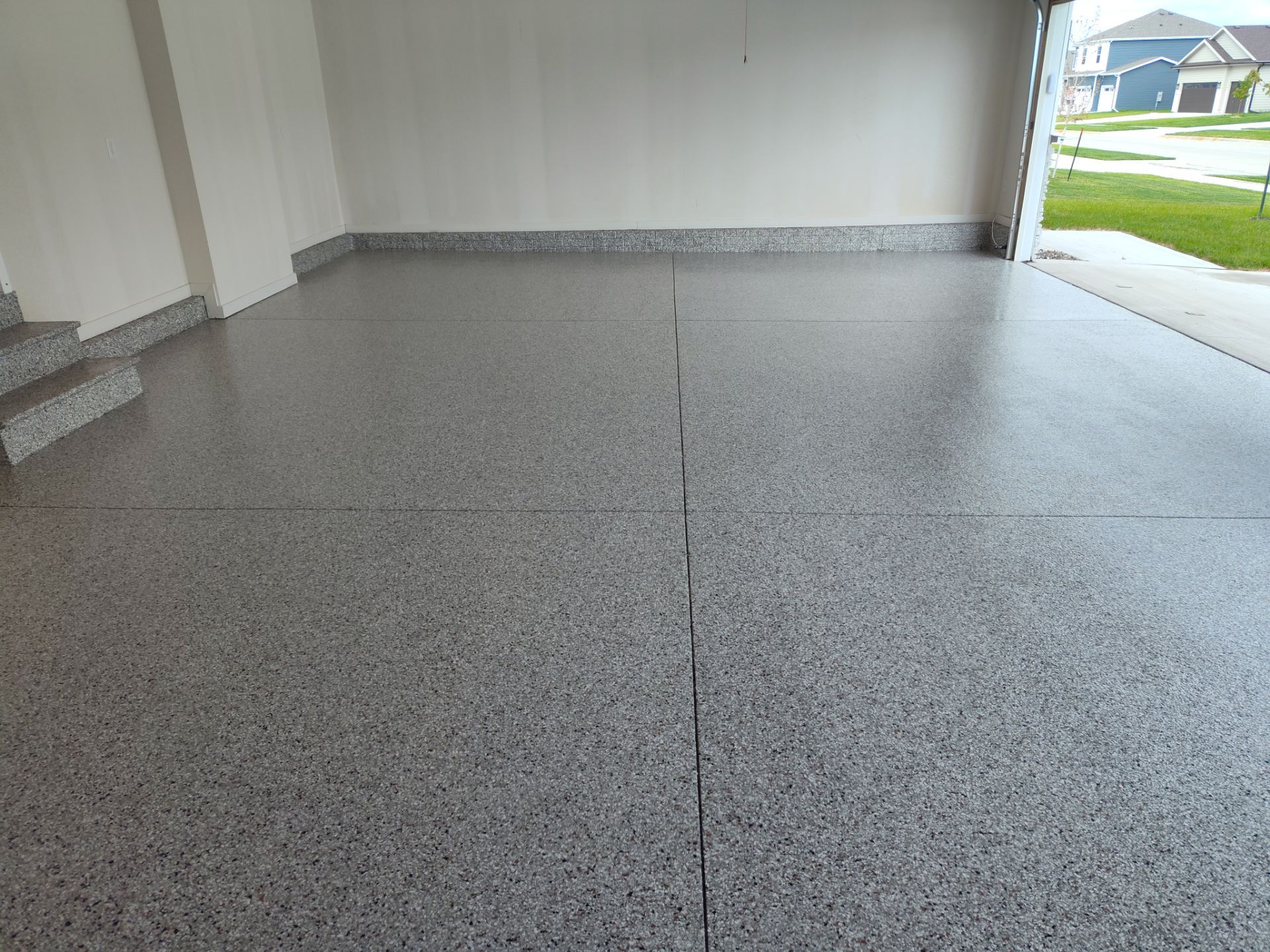 New Bondurant Garage Floor Coating by Revival Concrete Coatings, LLC