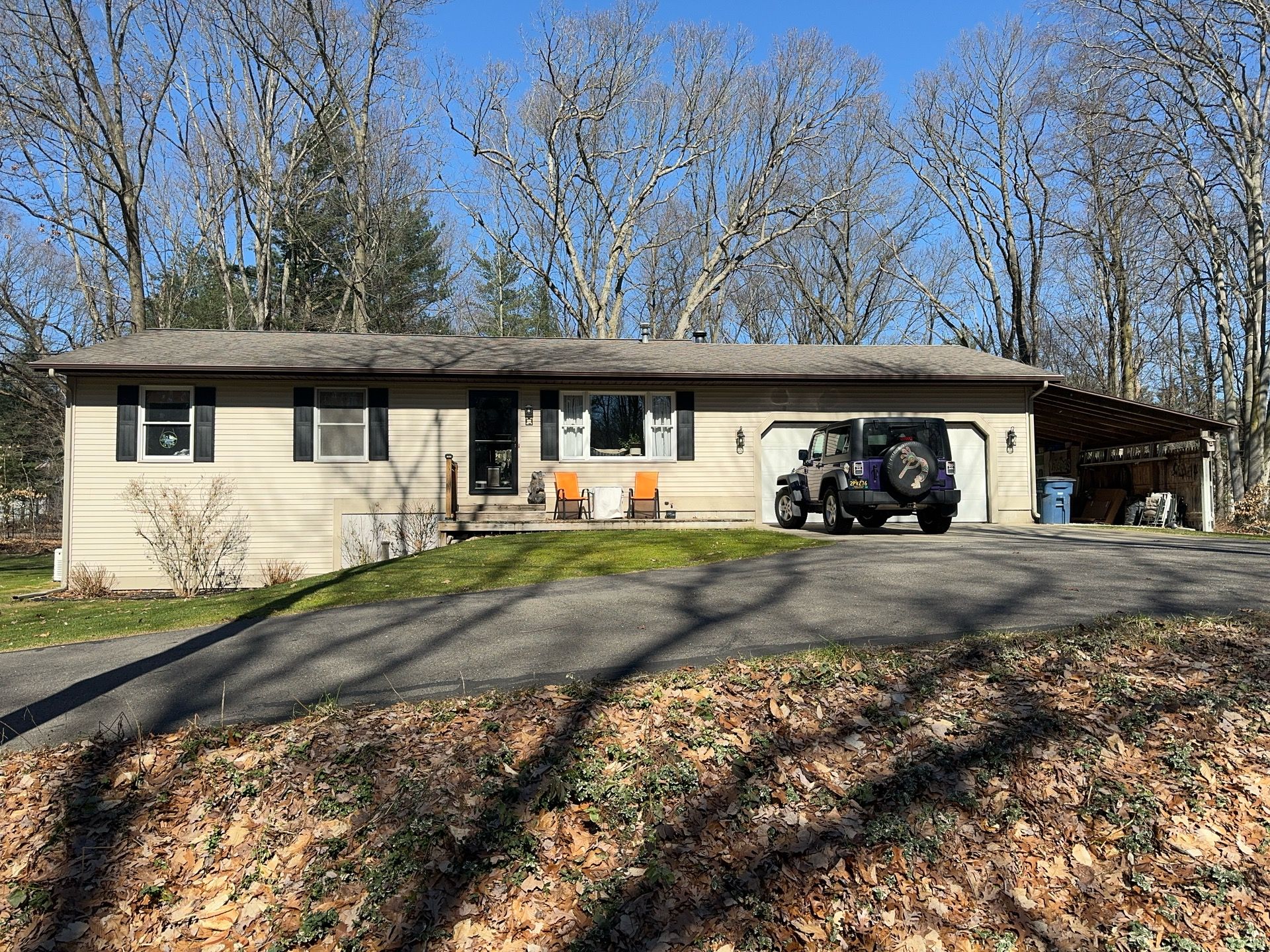 Siding, Deck and Versetta Stone by Avalon Roofing and Exteriors
