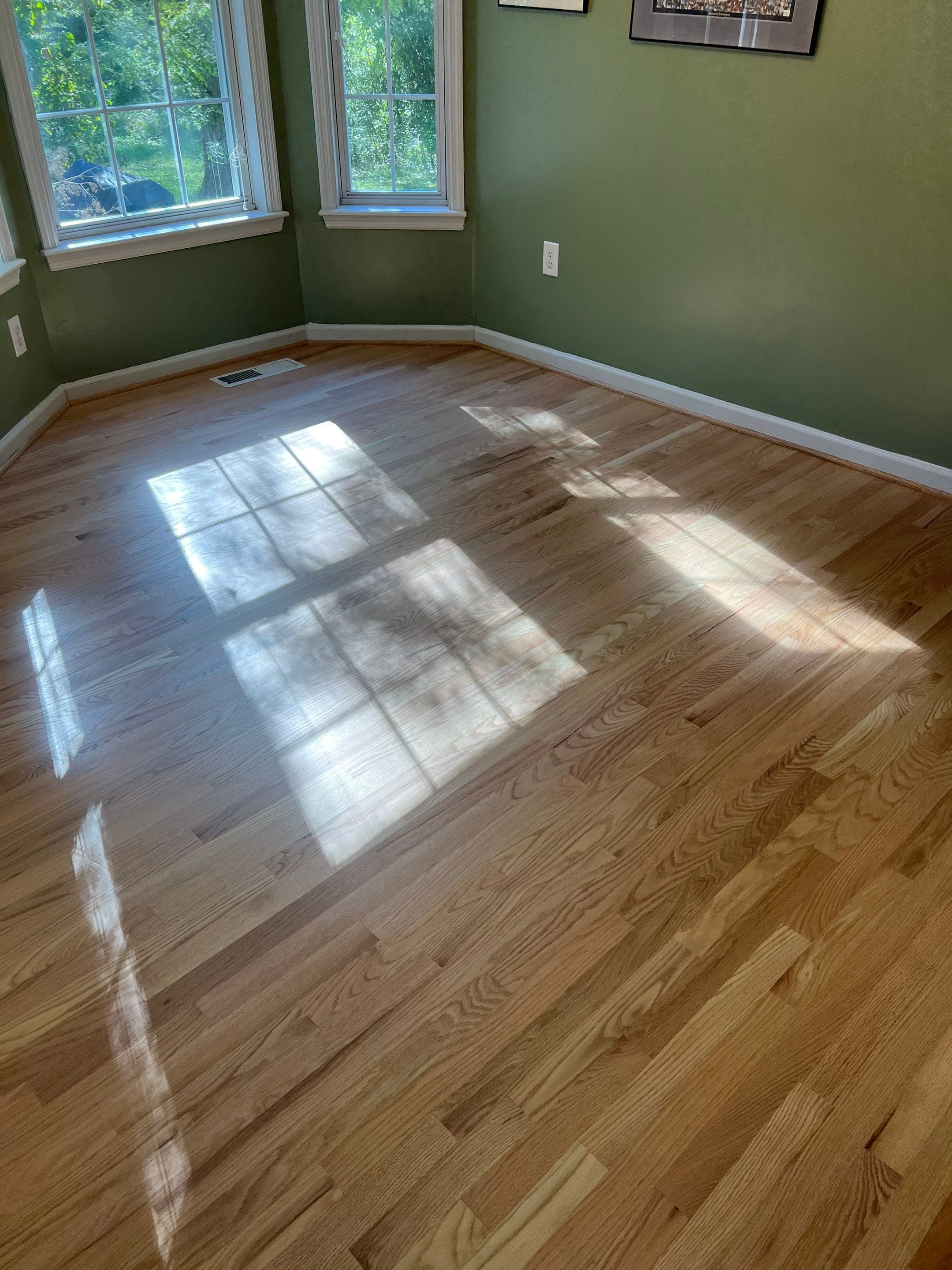 Refinishing an old Bruce prefinished hardwood floor by Accent Custom Floors