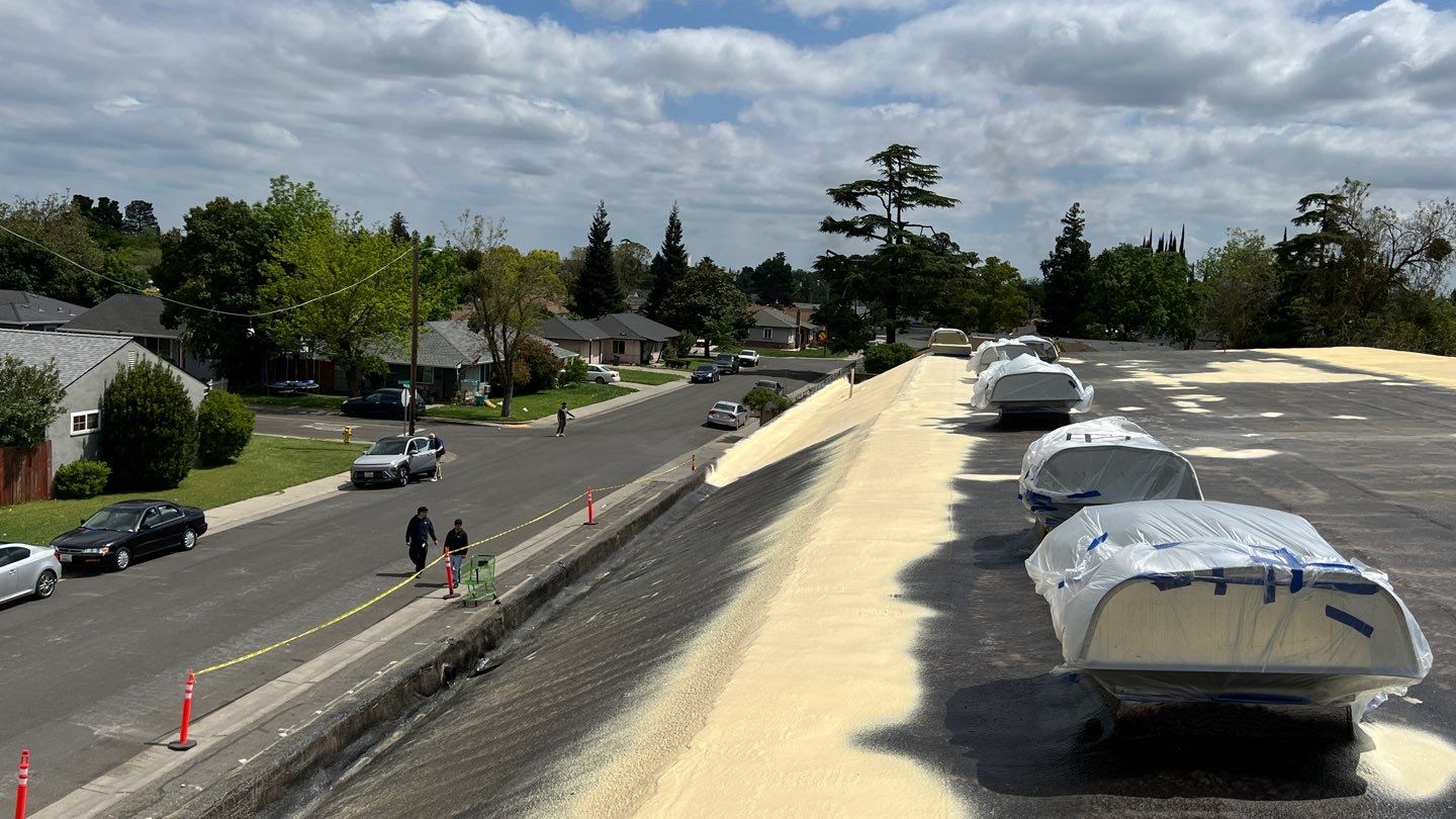 Foam Refurbish using Conklin Benchmark/PUMA XL coatings and spray foam by Straight Edge Roofing Inc