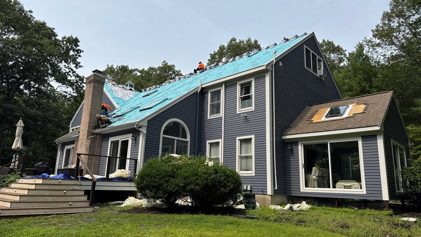 Solar-Ready Roof Replacement with GAF Pewter Gray Shingles & VELUX Skylights by Sensible Home Solutions