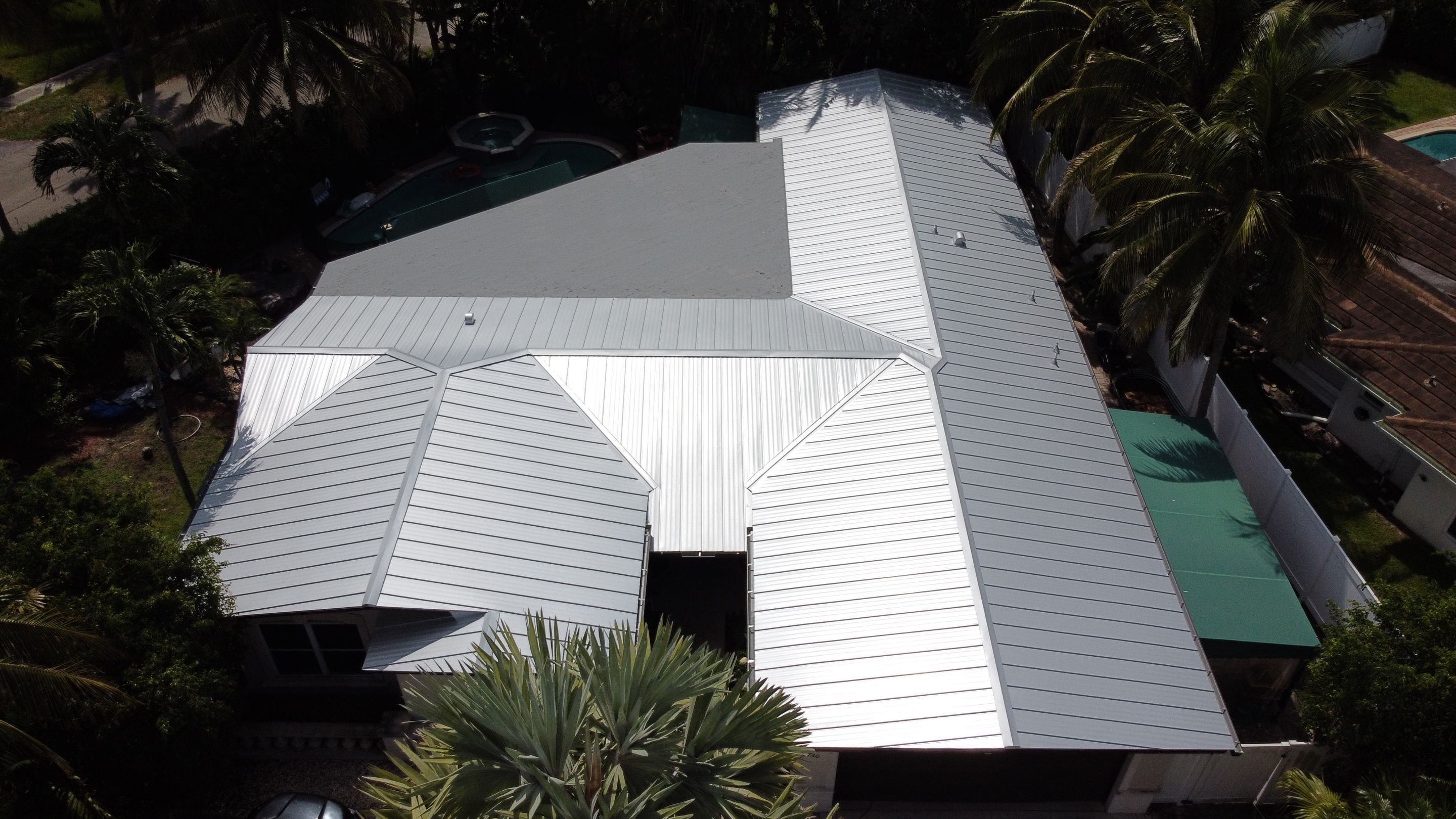 Residential Roofing Installation using 1" Nail strip metal roof by BLUES BROTHERS ROOFING