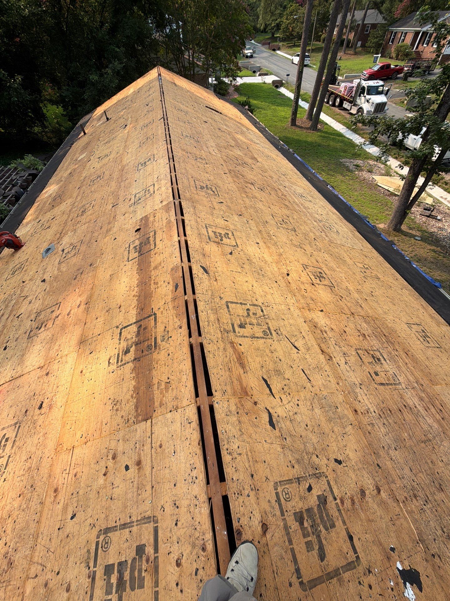 Asphalt Shingle Roof Replacement and Gutter Installation in Richmond by Cade Construction