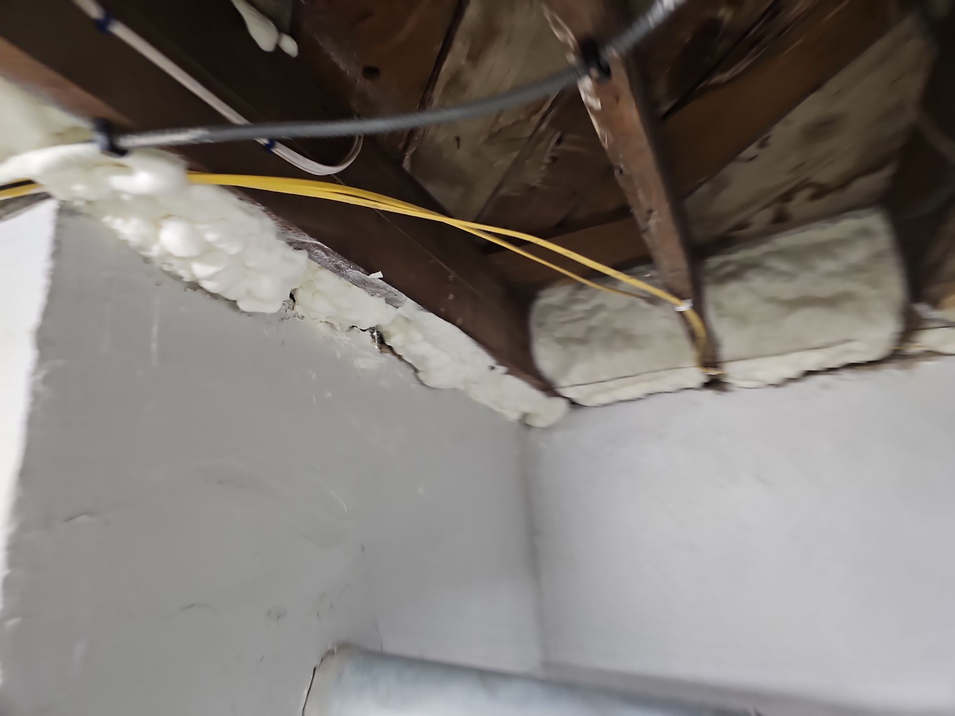 Attic Insulation using open cell spray foam by NYS Foam & Energy